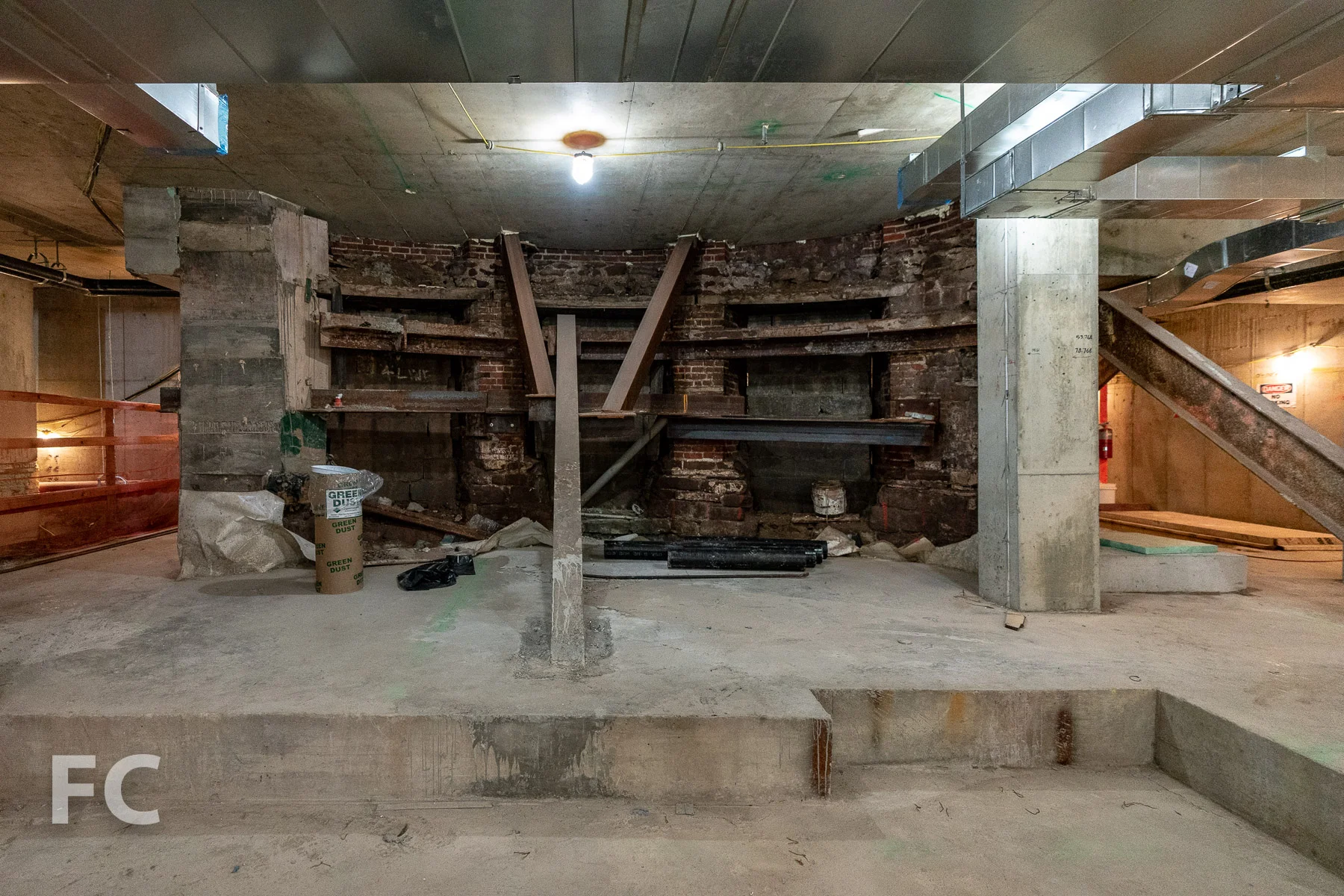 Foundations of the Robert & Anne Dickey House integrated into the new structure’s cellar level.