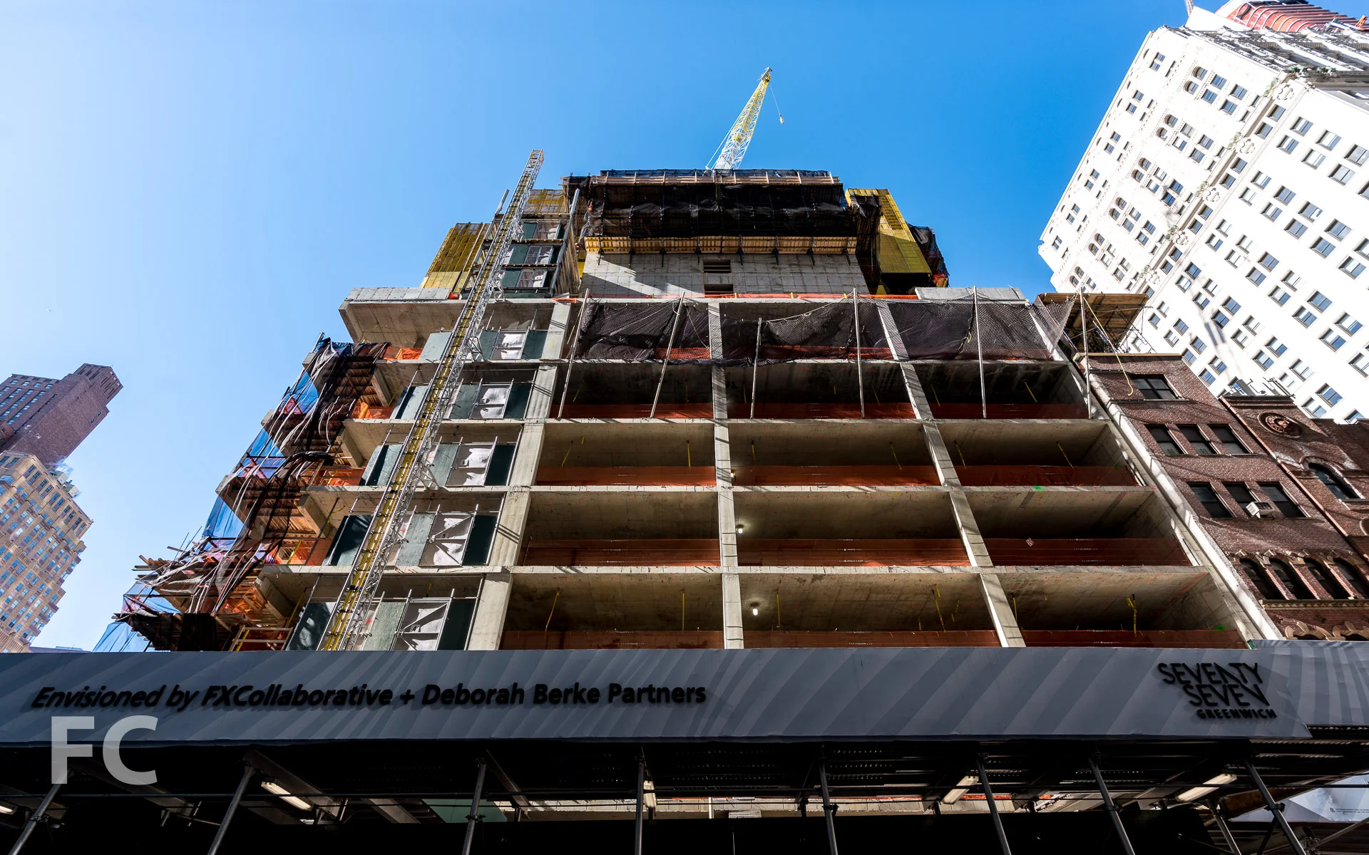Looking up at the east facade.