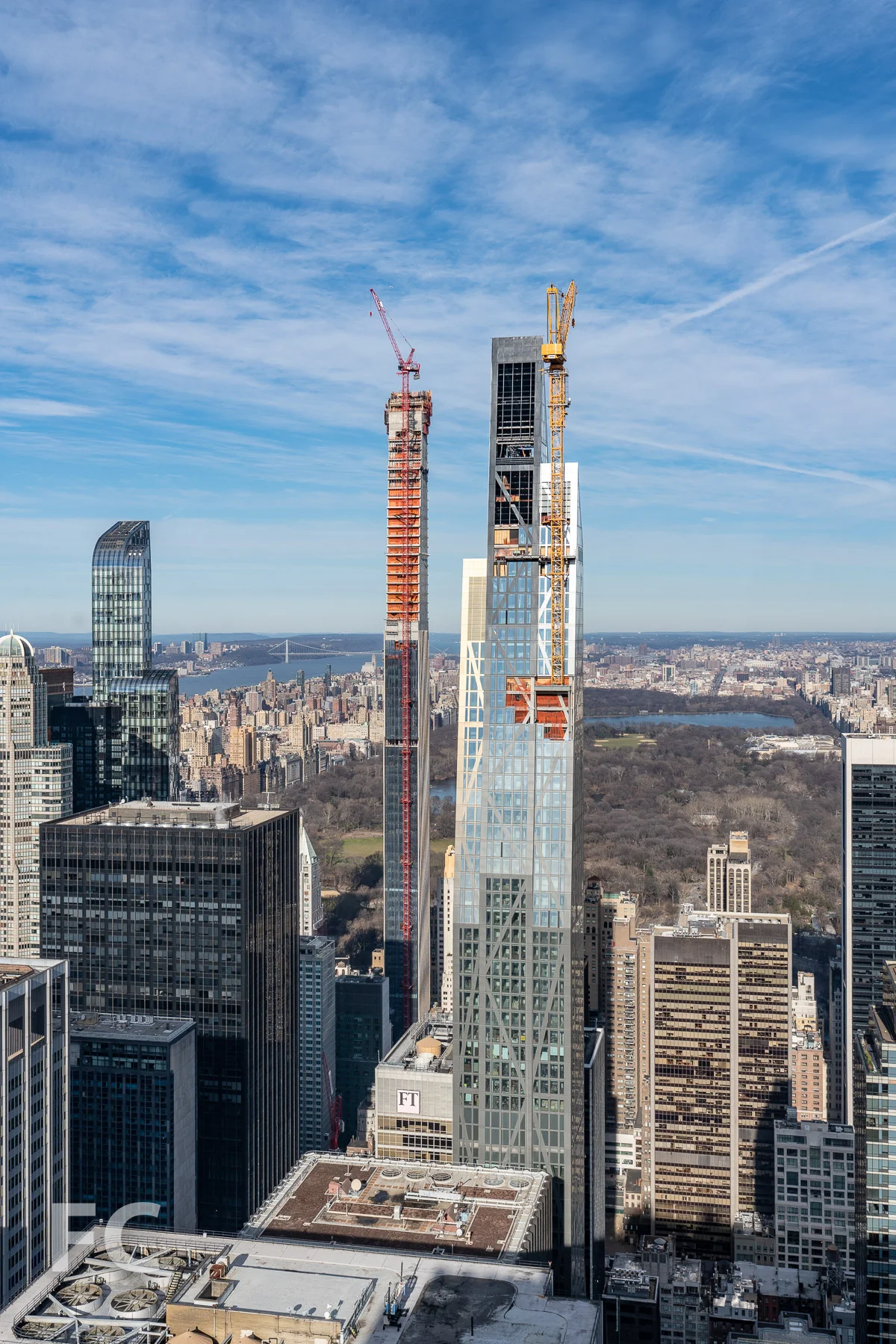 South facade of 53 W 53 (right) and 111 W 57 (left) rising in Midtown.
