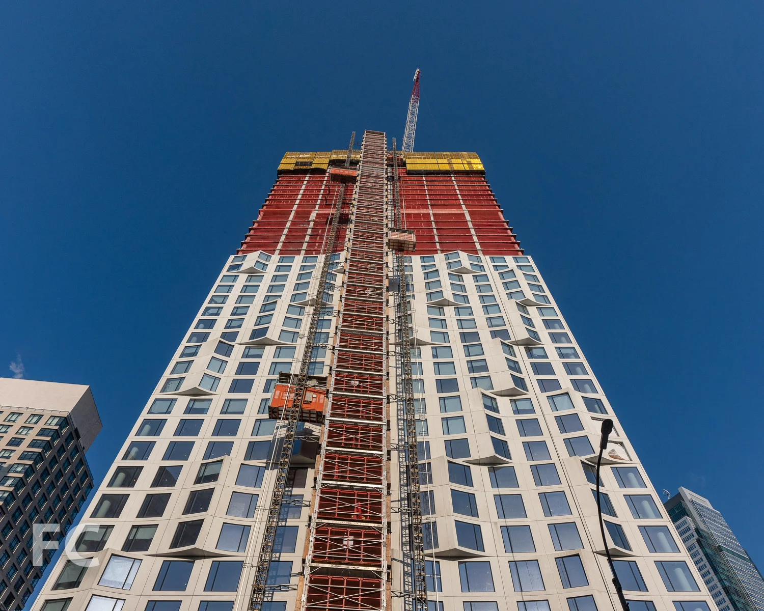 Looking up at the east facade.