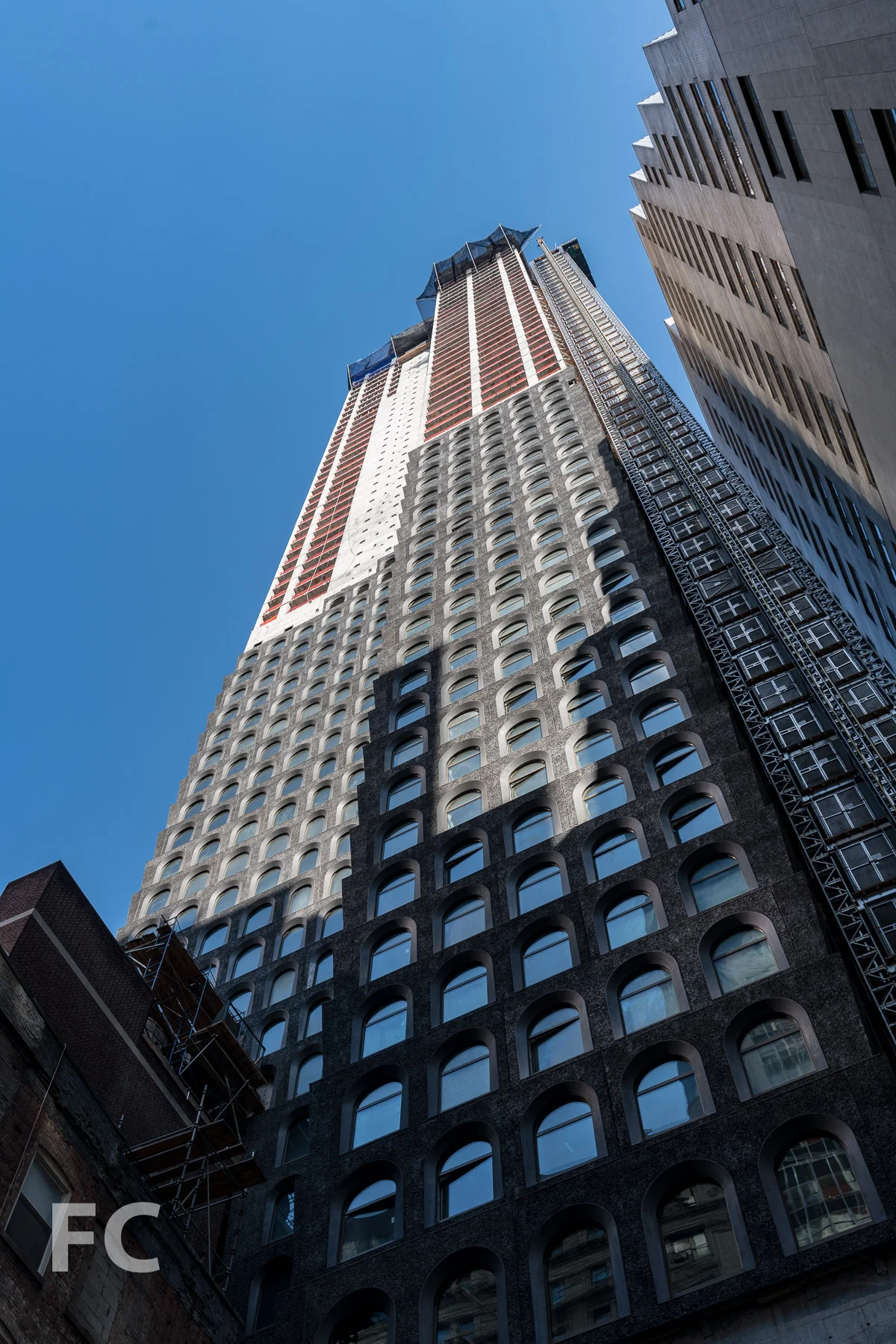 Looking up at the west facade from Fulton Street.
