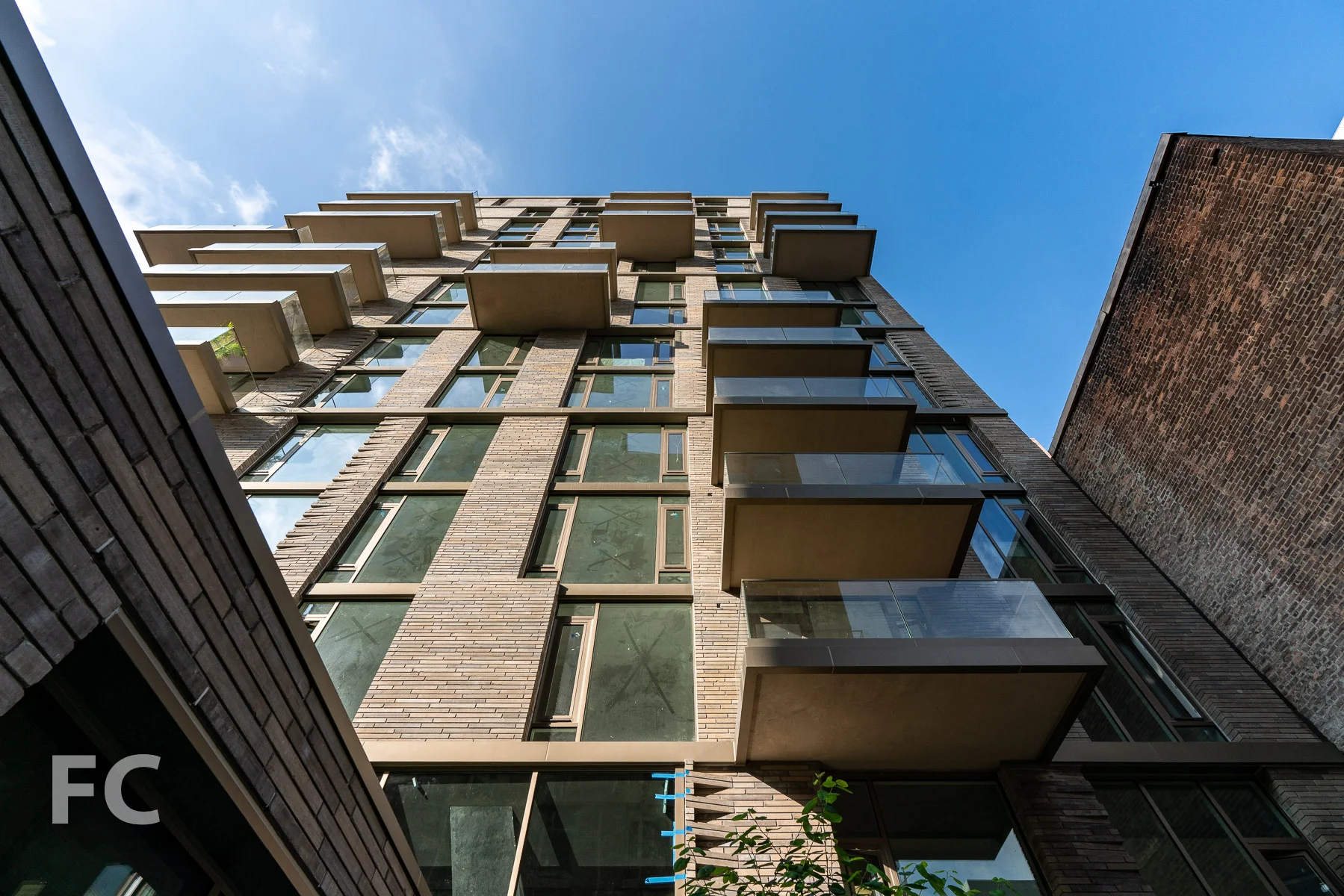 Looking up at the courtyard facade of the West 43rd Street tower.