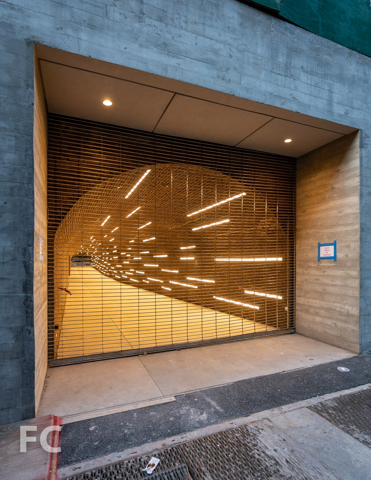 A brick-vaulted private drive connects West 27th and 28th streets.