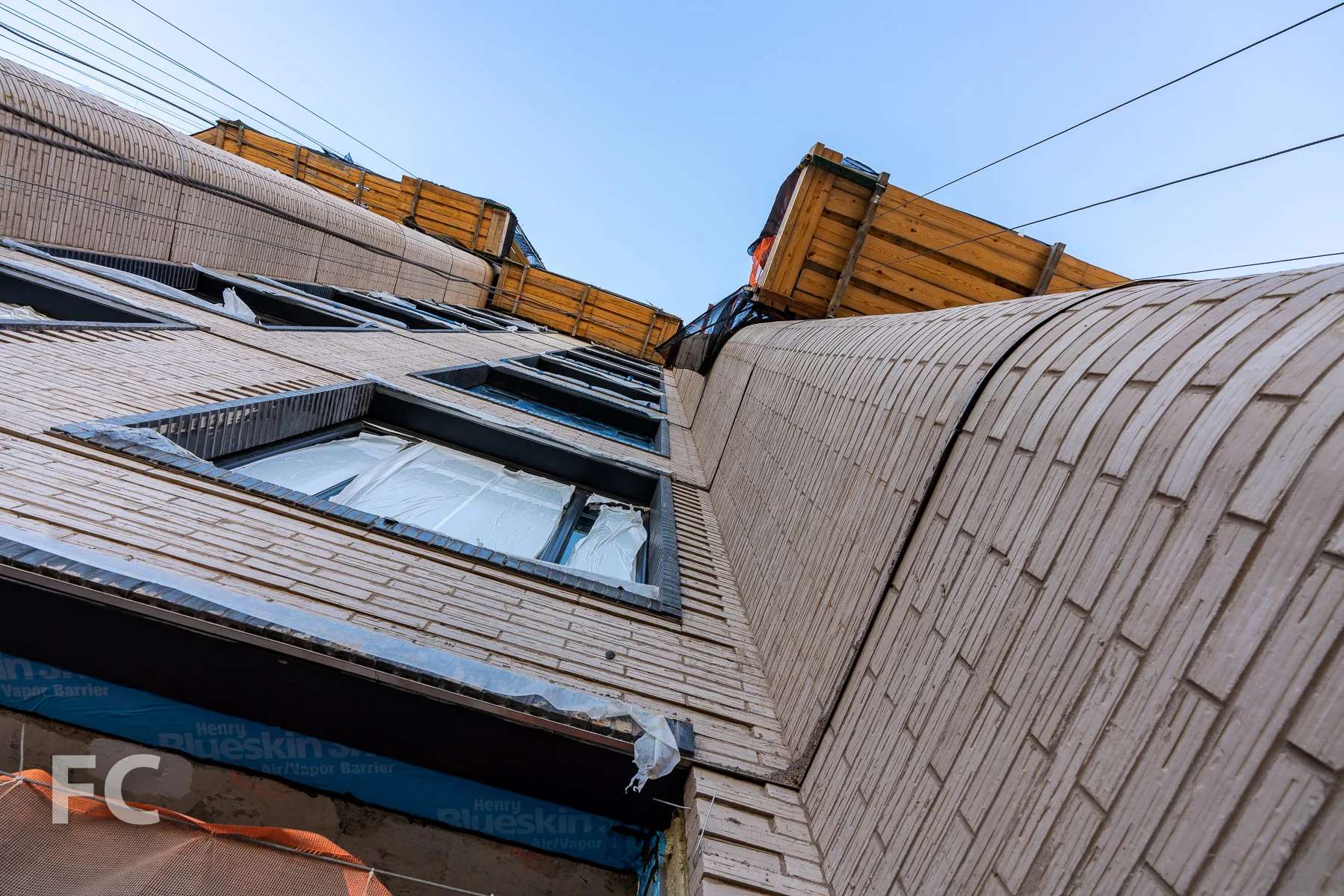 Looking up at the rounded brick corners.