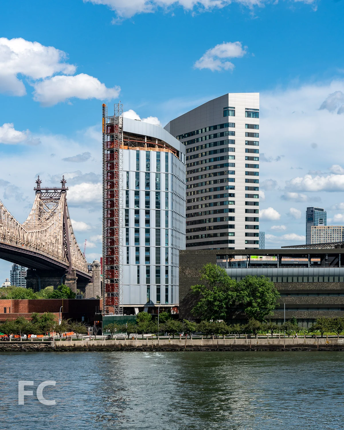 West facade of the hotel (center left) and the House at Cornell Tech (center right).