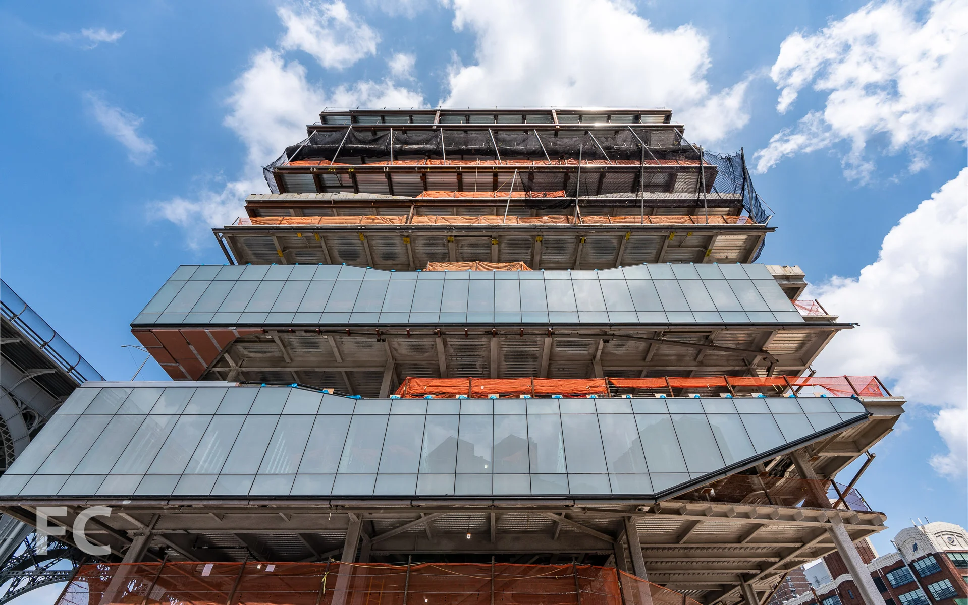 Looking up at the south facade of the west building.