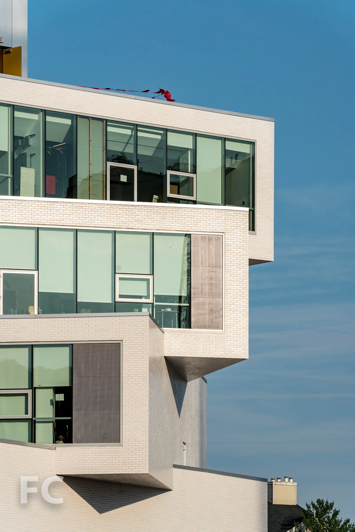 Close-up of the rotating classroom bars at the east facade.