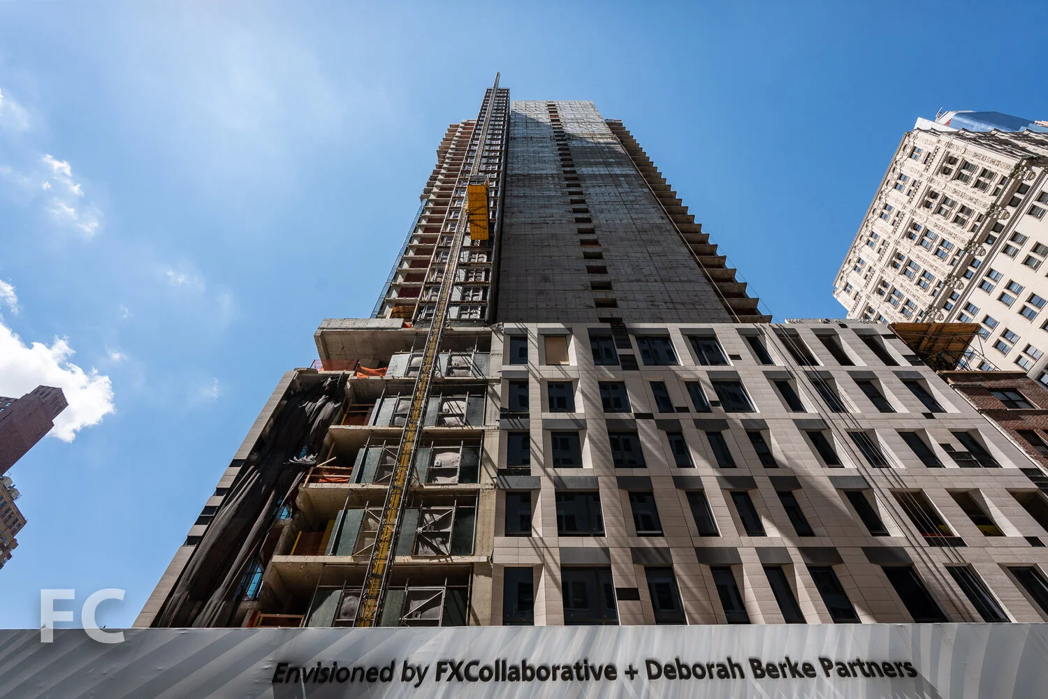 Looking up at the east facade.