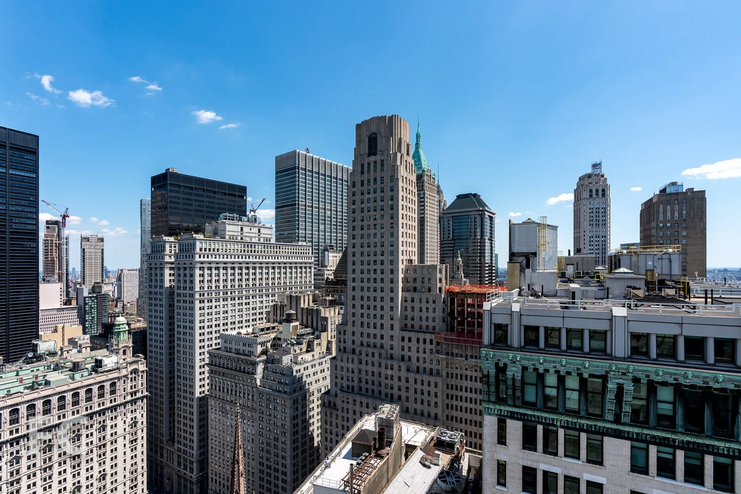 View northeast towards the Financial District and Brooklyn from the top floor.