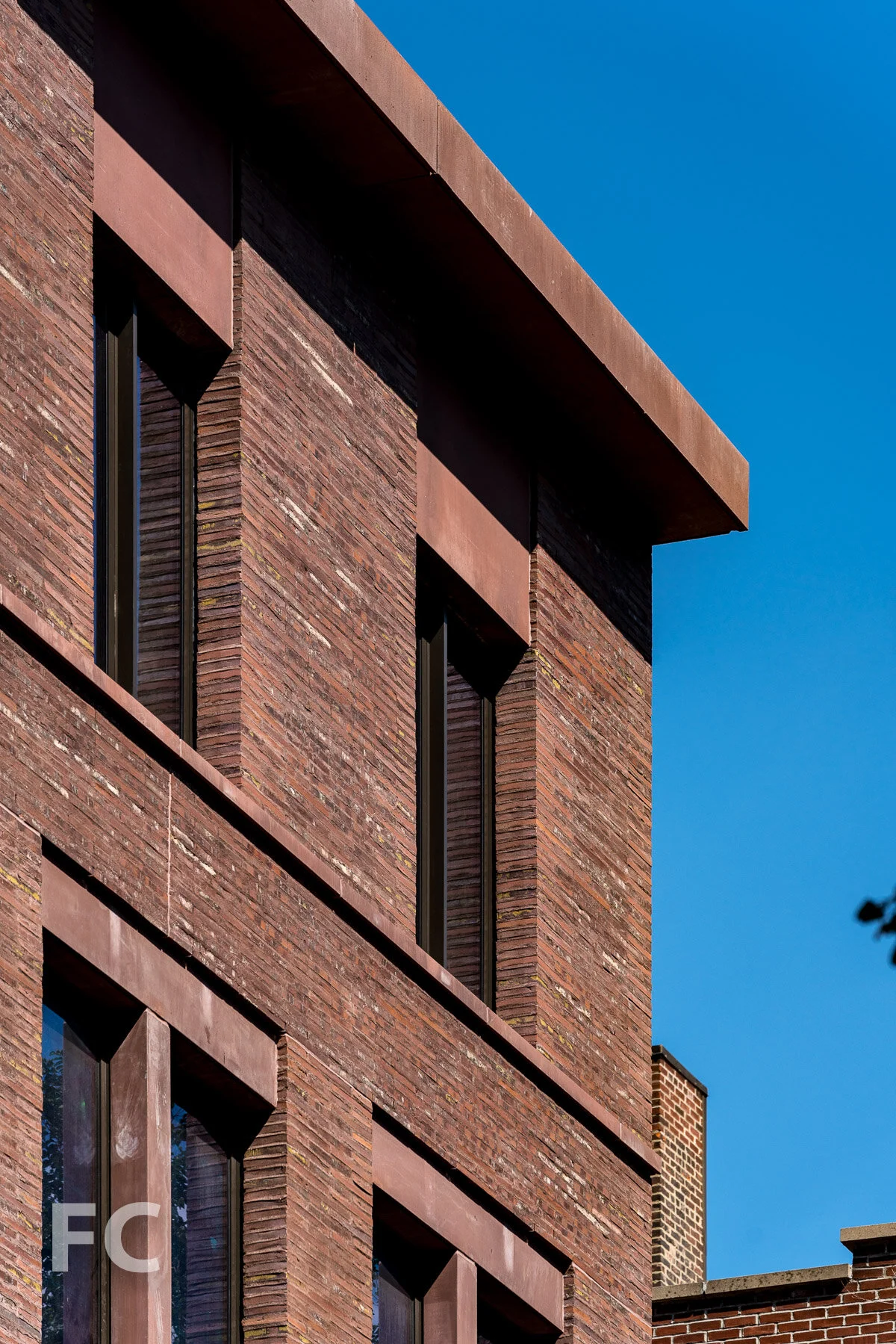 Facade close-up at the southeast corner.