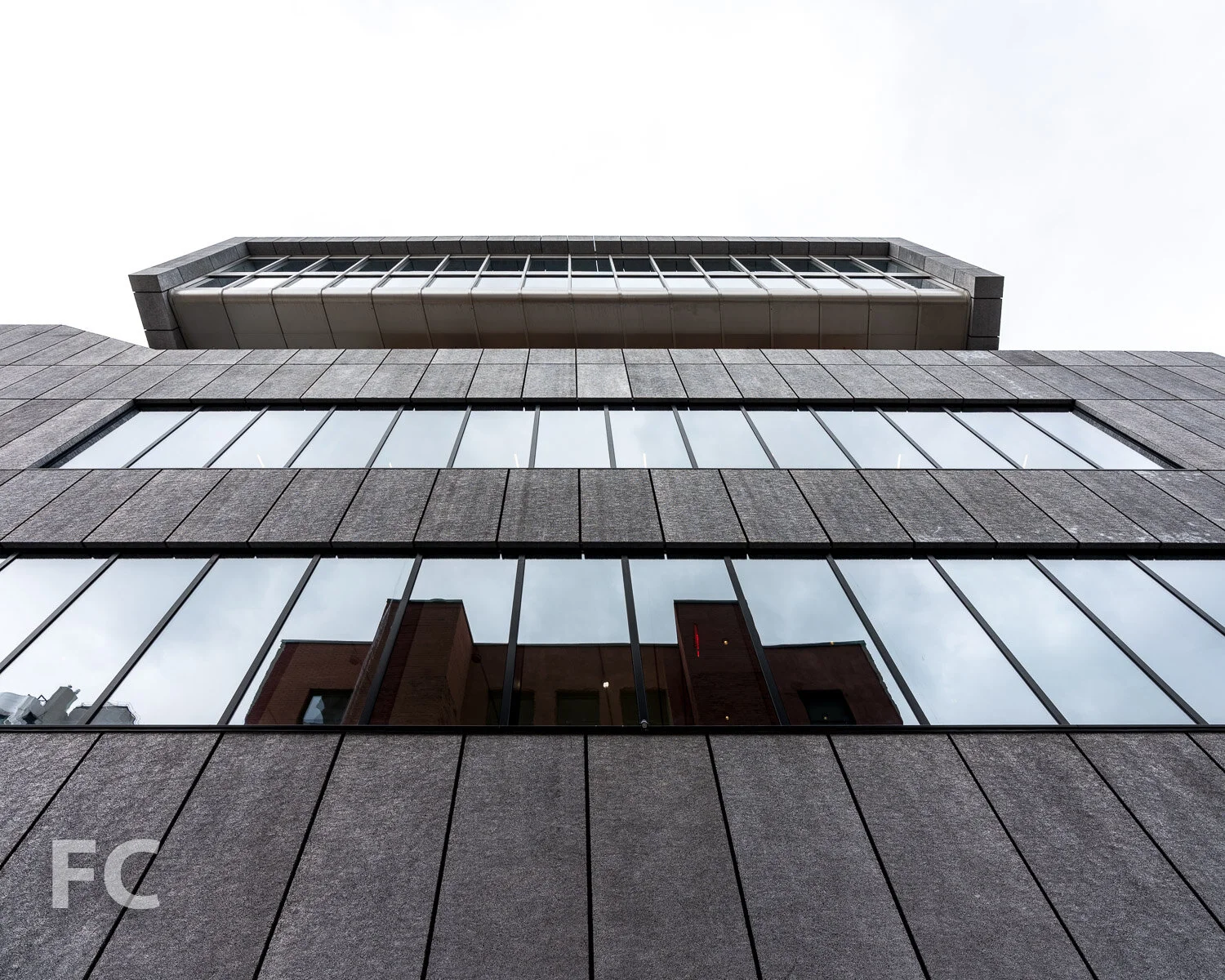 Looking up at the south facade.