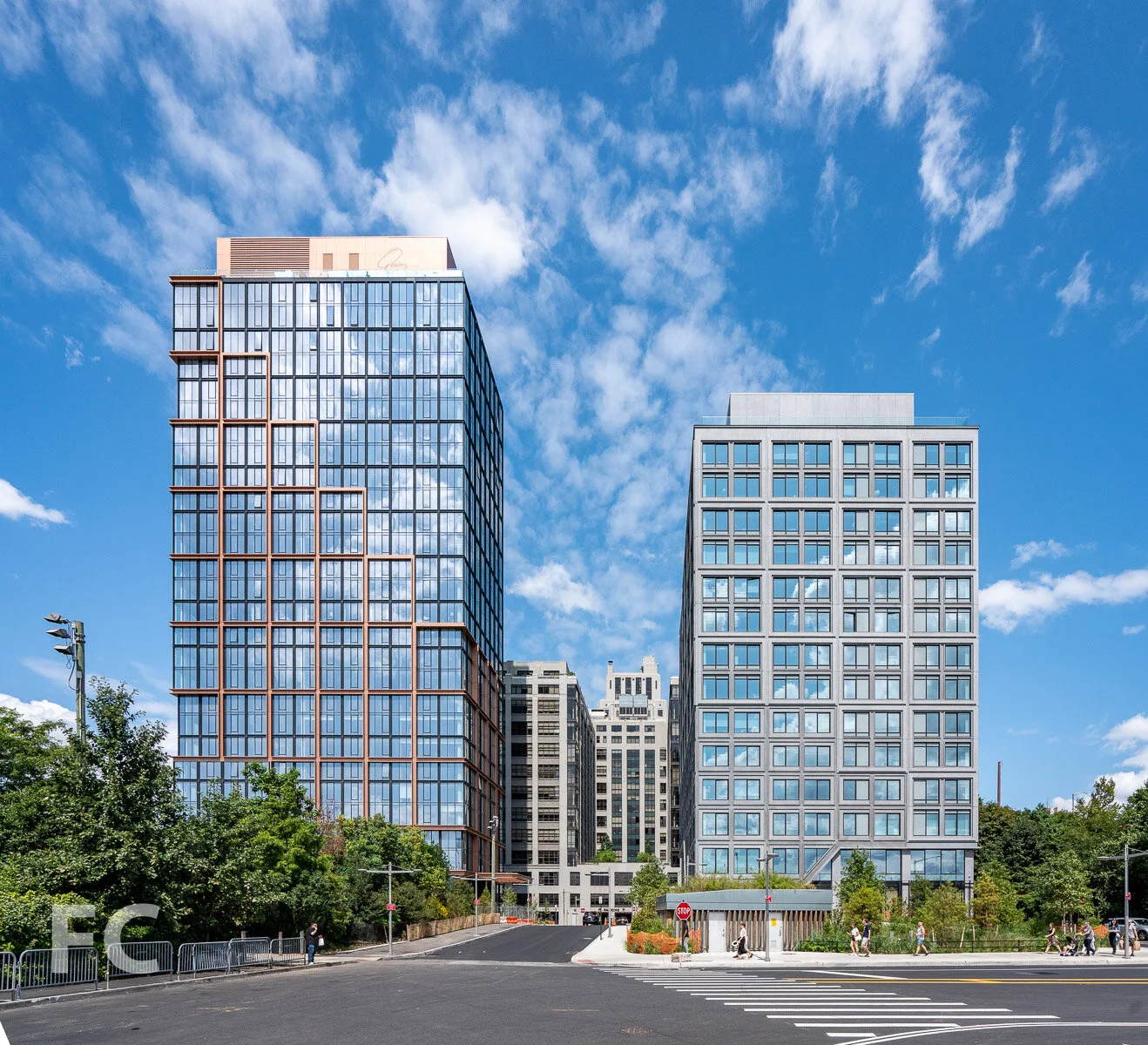 South façade of 15 Bridge Park Drive (right) and Quay Tower (left).
