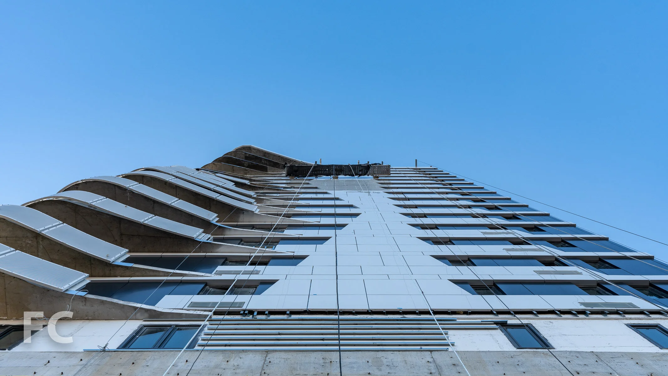 Looking up at the west facade.