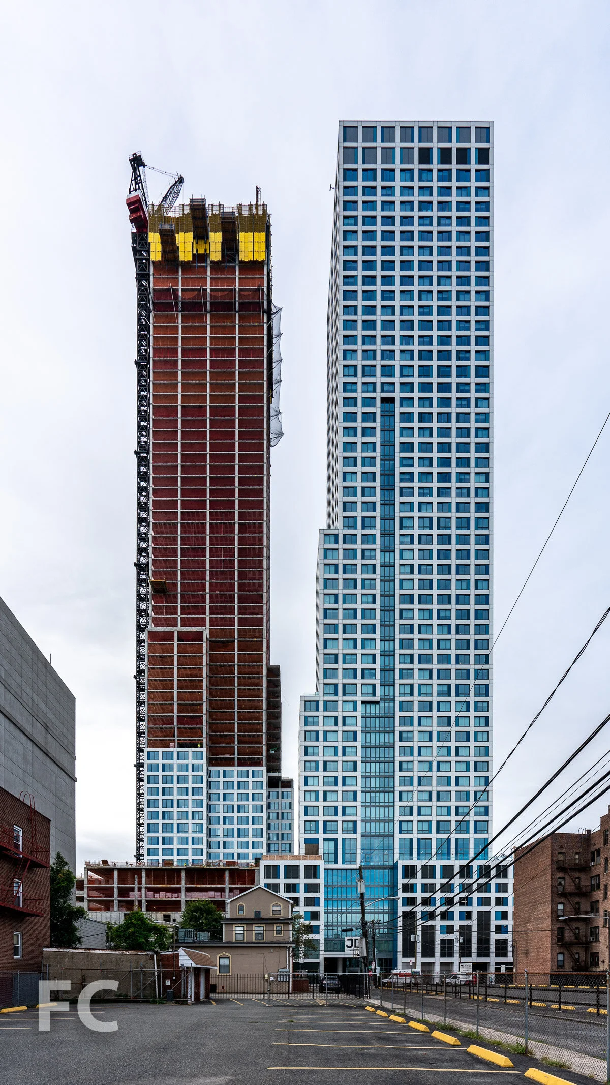 North facade of phase one (right) and phase two (left) from Van Reipen Avenue.