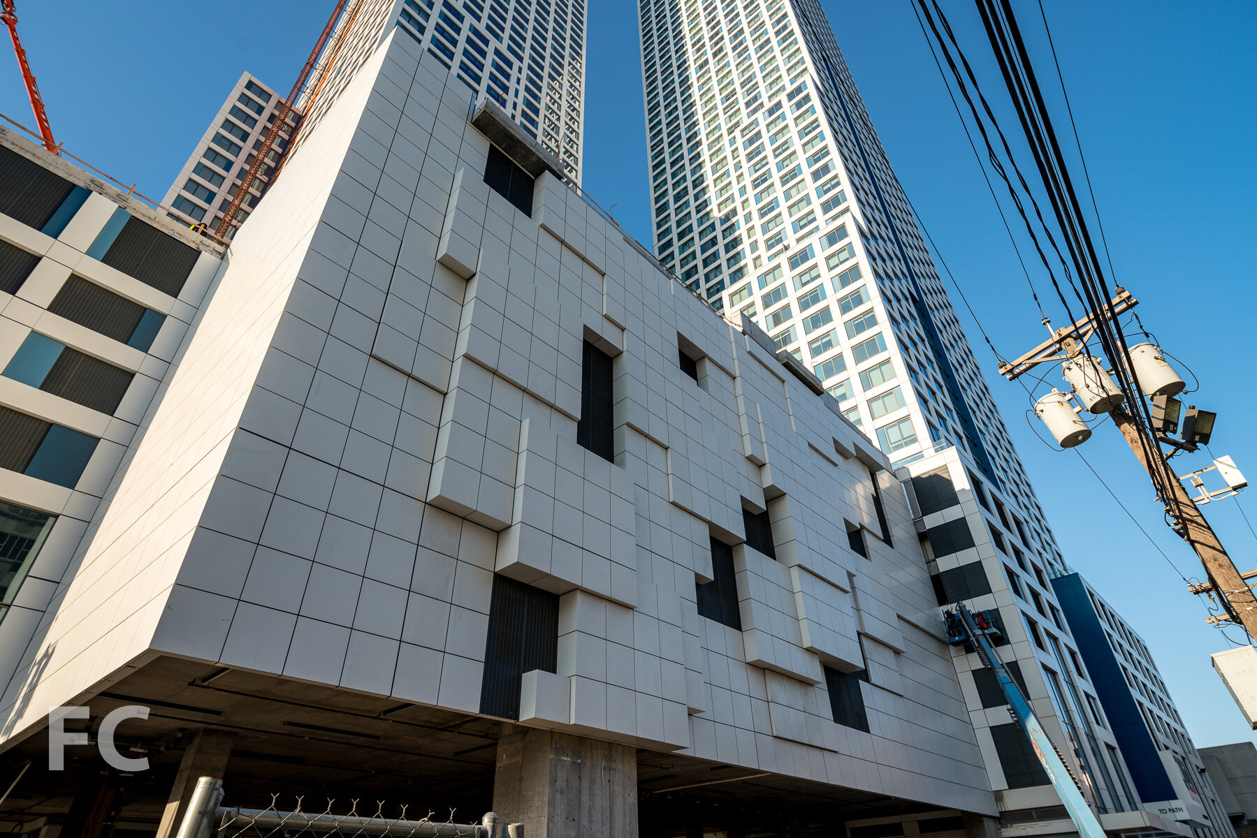 Looking up at the north facade of phase one (right) and phase two (left).