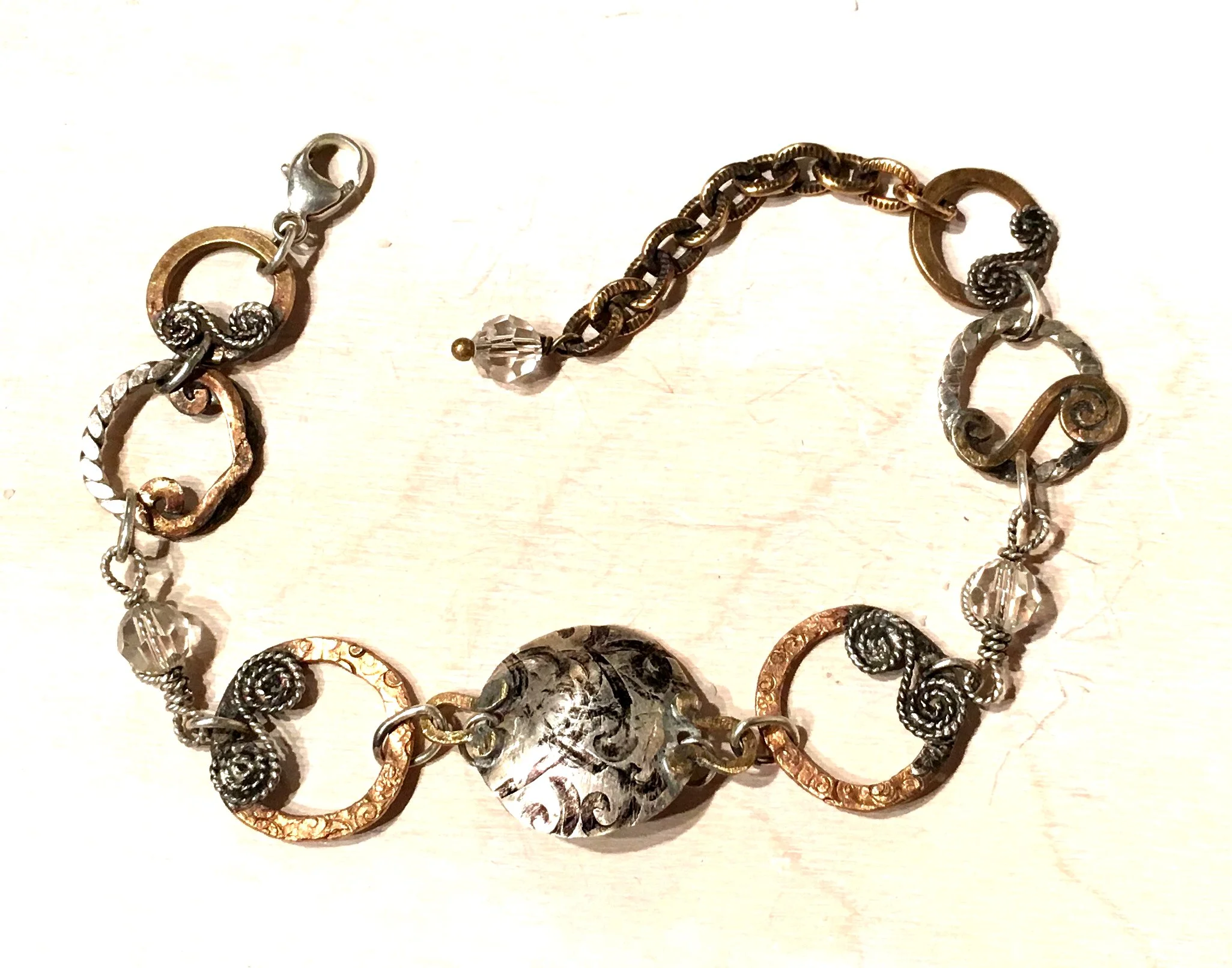 PAVANNE JEWELRY. SILVER SWIRL REVERSE W PEARL W SCROLL LINKS 300DPI.jpg