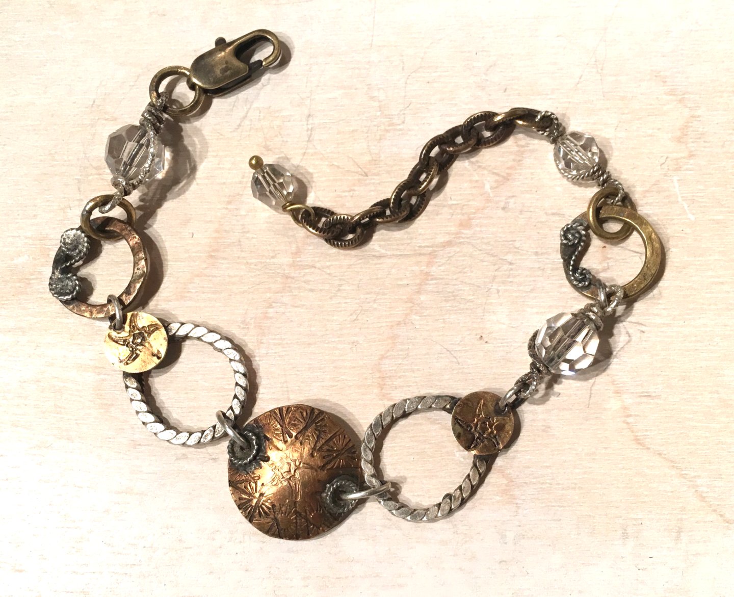BRASS FACE DOME BRACELET W SCROLLS WEB.jpg