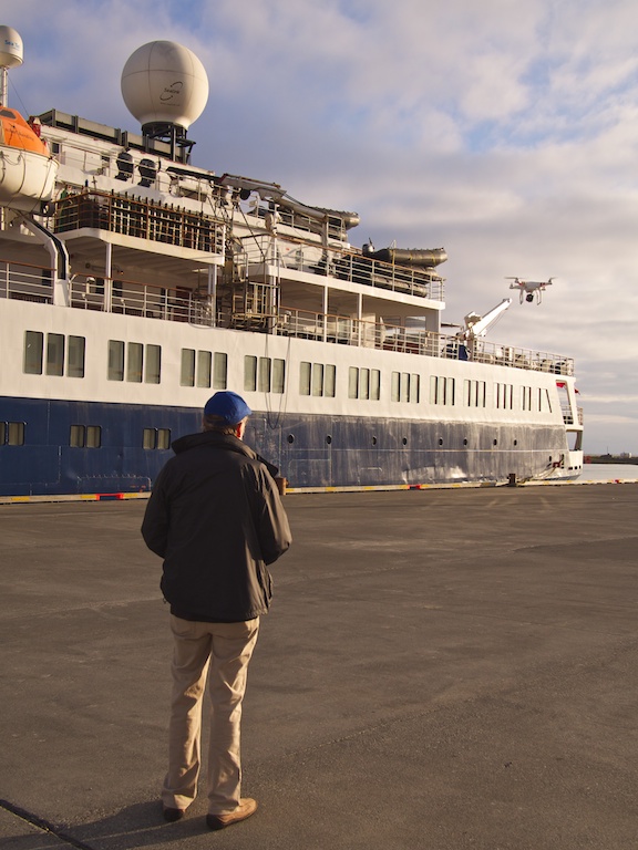 Bill with his quadcopter cam in port in Hófn, Iceland