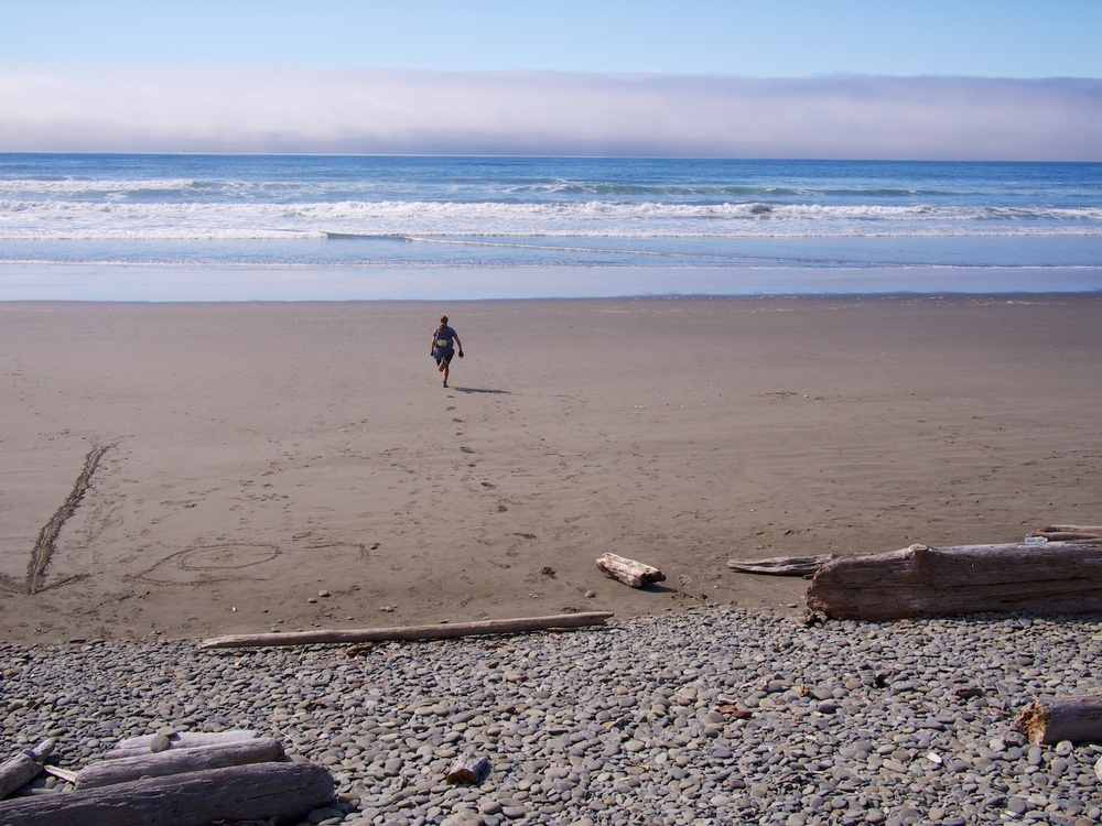 Running to the sea on the Pacific Ocean.