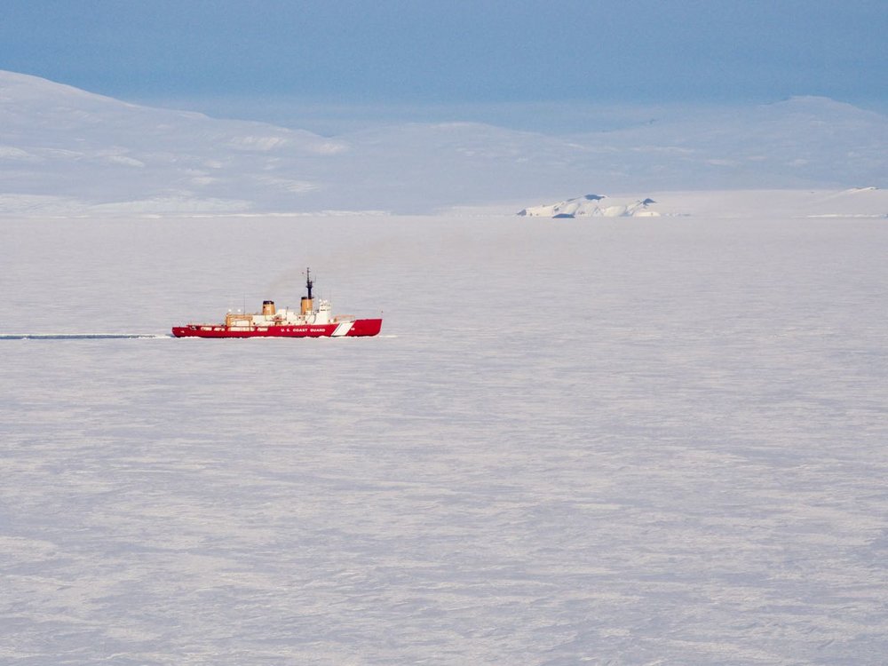 The Polar Star icebreaker inching close to McMurdo Station.