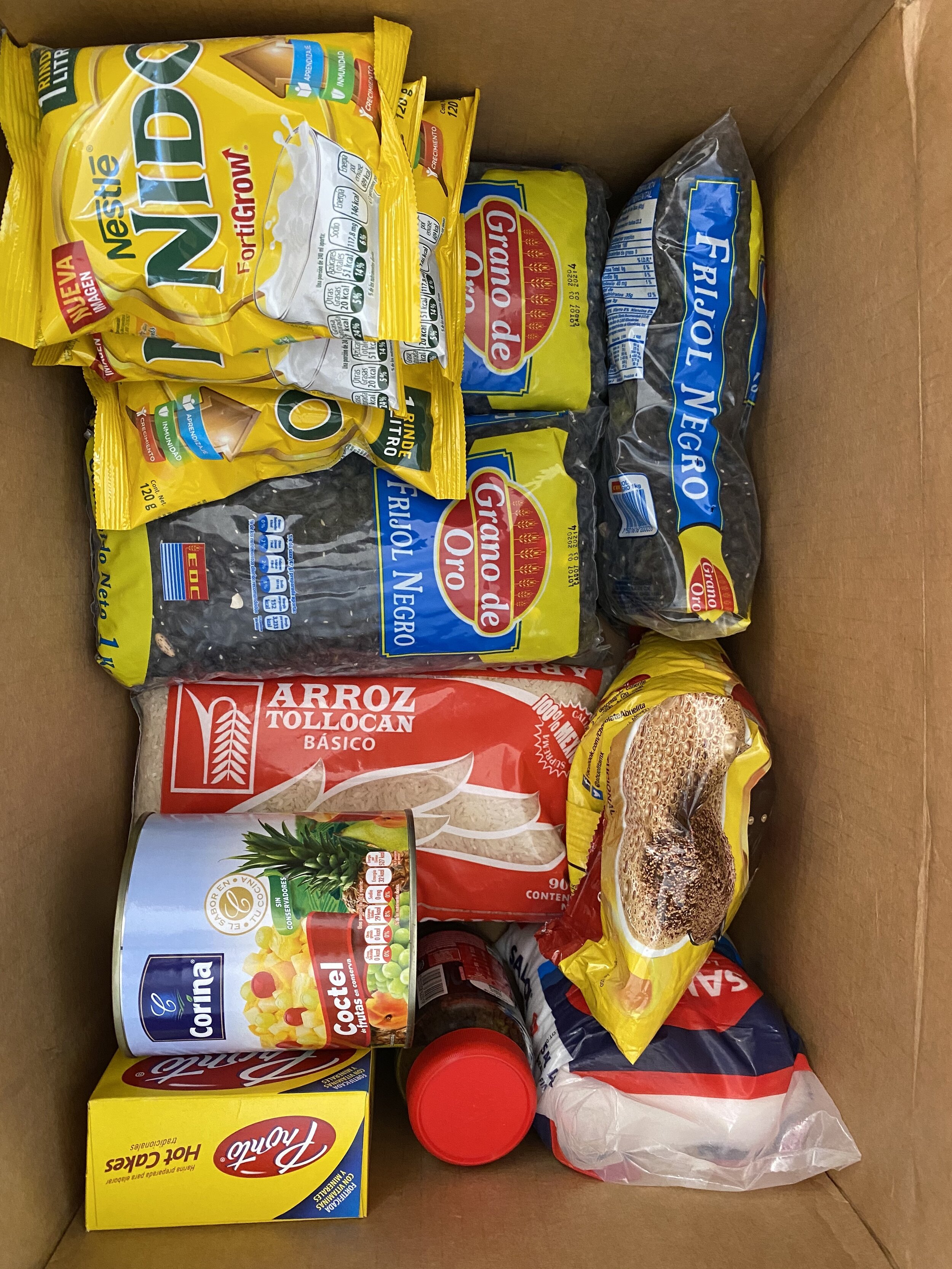  There are two families, so everything is times two and we are taking these items every two weeks. In the village, it turns out that the recipients of these  despensas  turn around and share with neighbors so your donations are going a lot further th