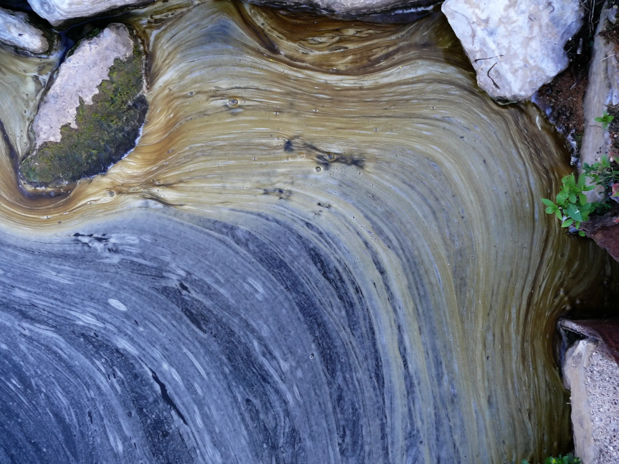 interesting texture created by pollution along the Mississippi river