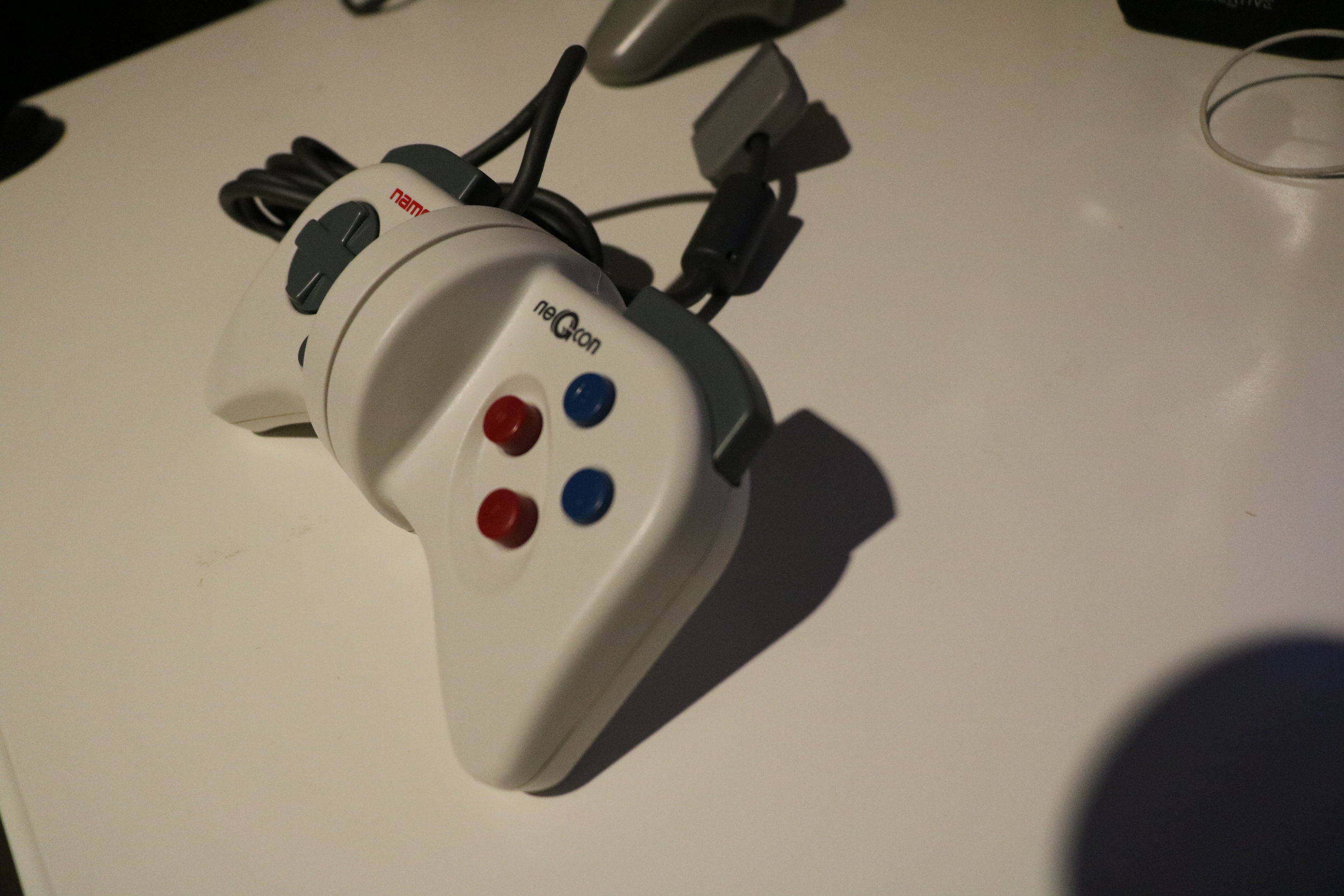 Note that the maroon (I and II buttons) have a very high vertical profile, more than I've seen in any controller for a button (as opposed to triggers).