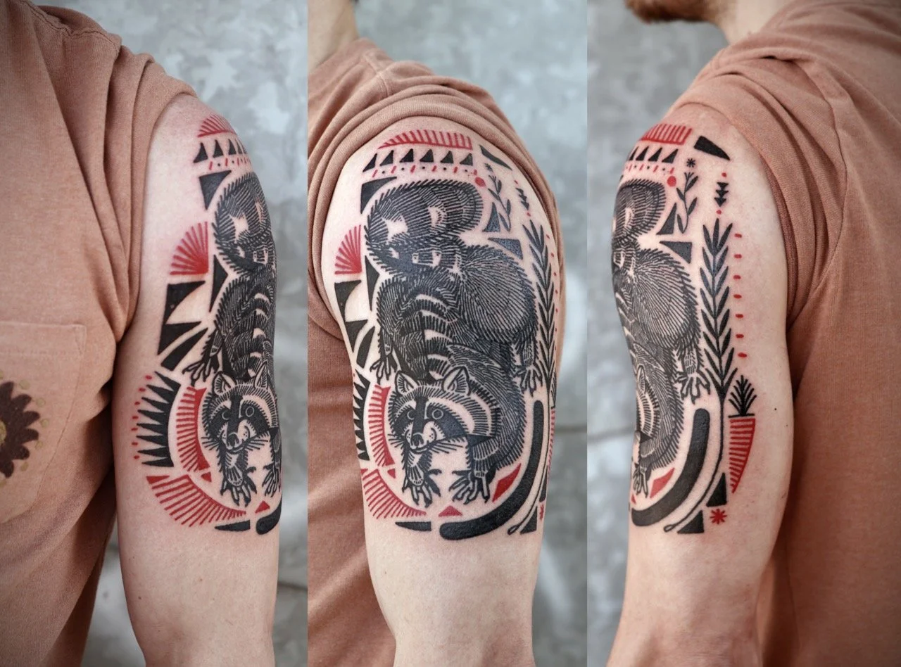 evanracoontattoo Large.jpeg