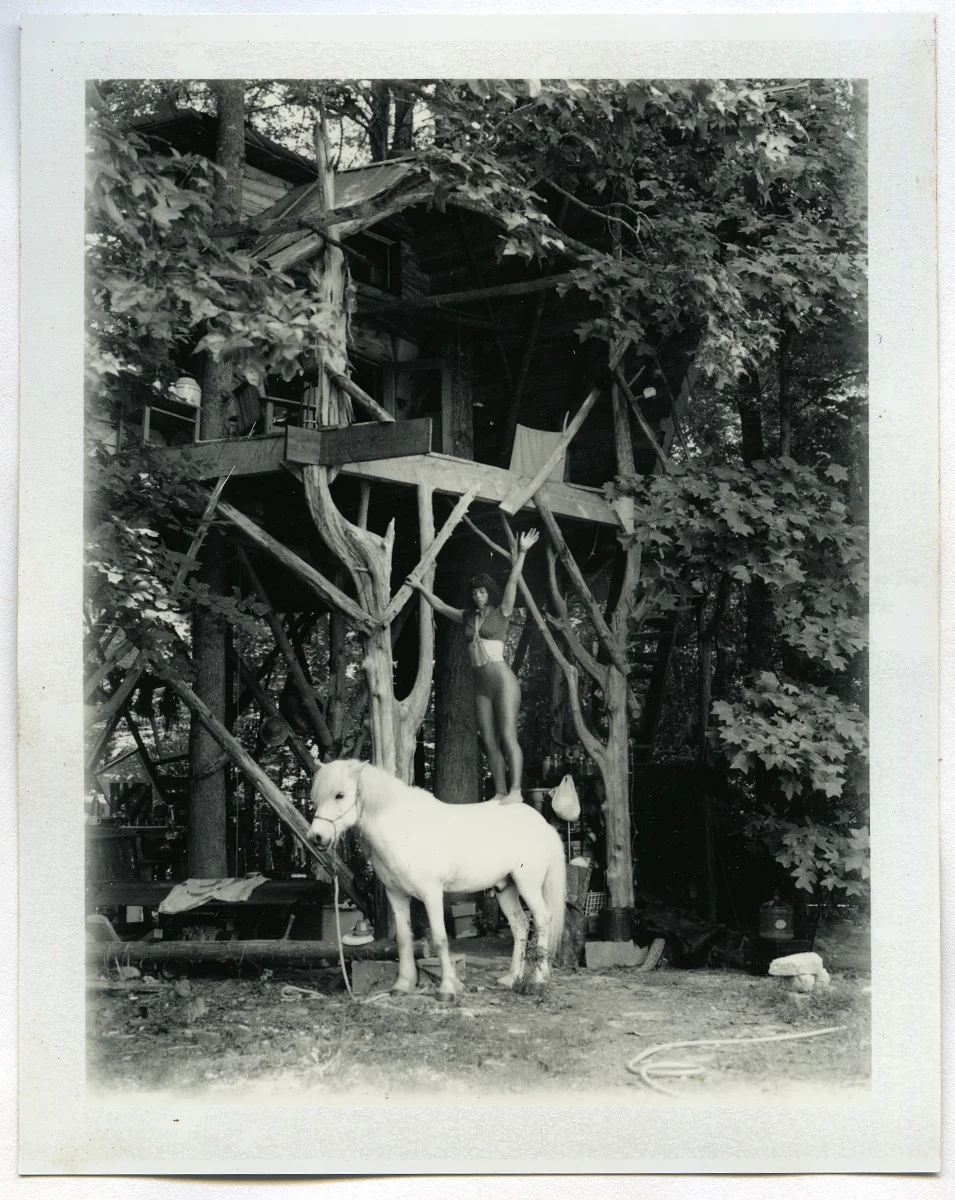Ada and Kari in front of their home.