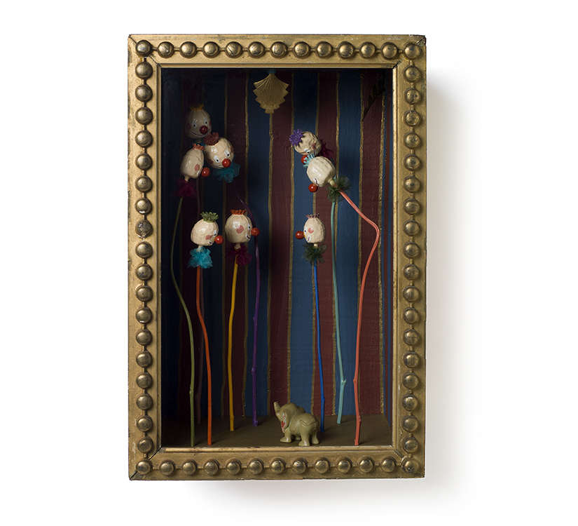 FOUND 11.5" x 17" x 9" rubber elephant, brass findings and poppy stems and pods