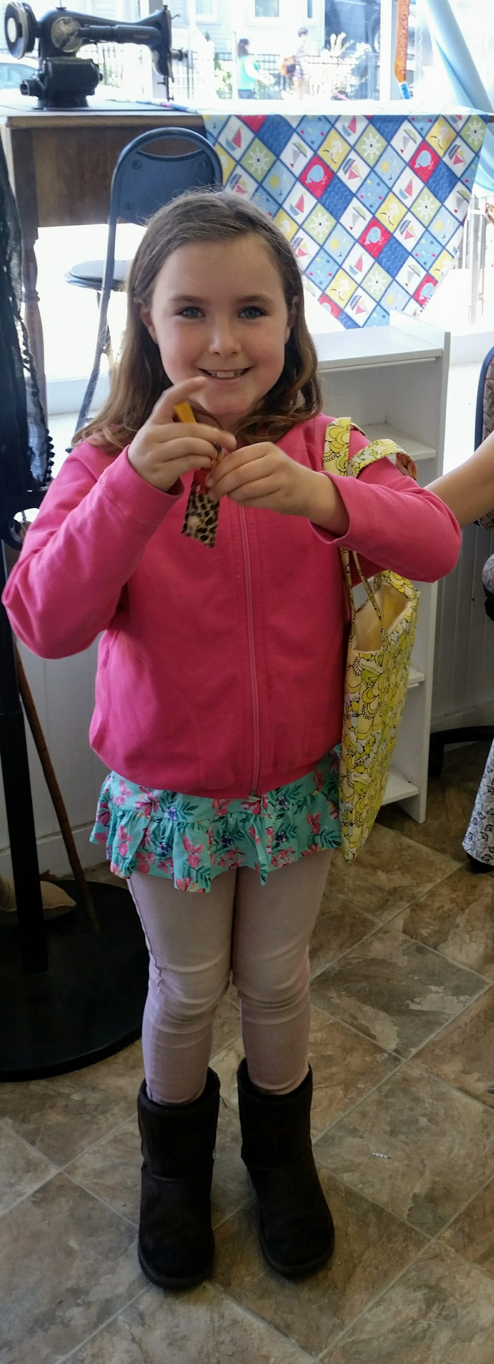 Georgia with her creations - chapstick holder and a handbag!