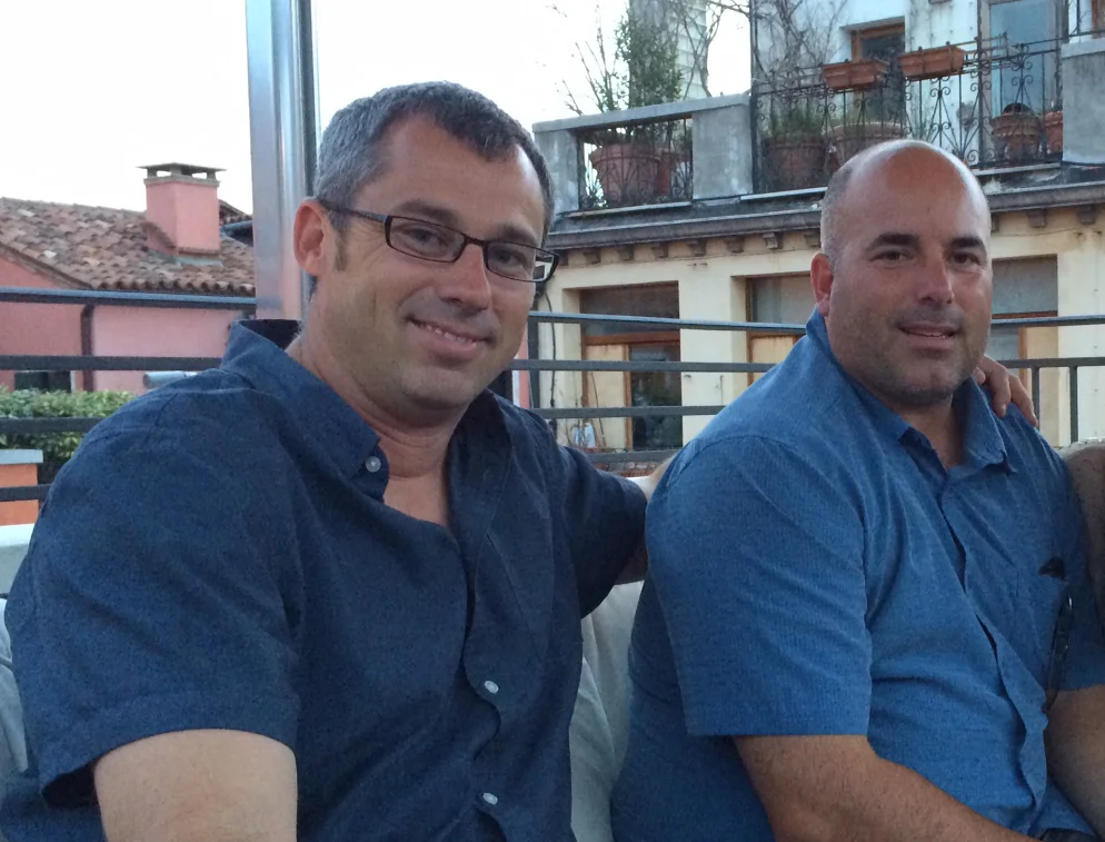 Dovetail Principal Chad Rollins and Managing Principal Scott Edwards on a rooftop in Venice