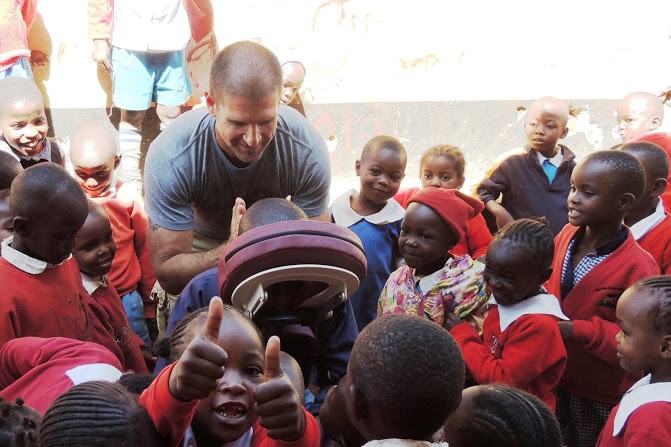 Volunteering in Africa giving the children their first massages.