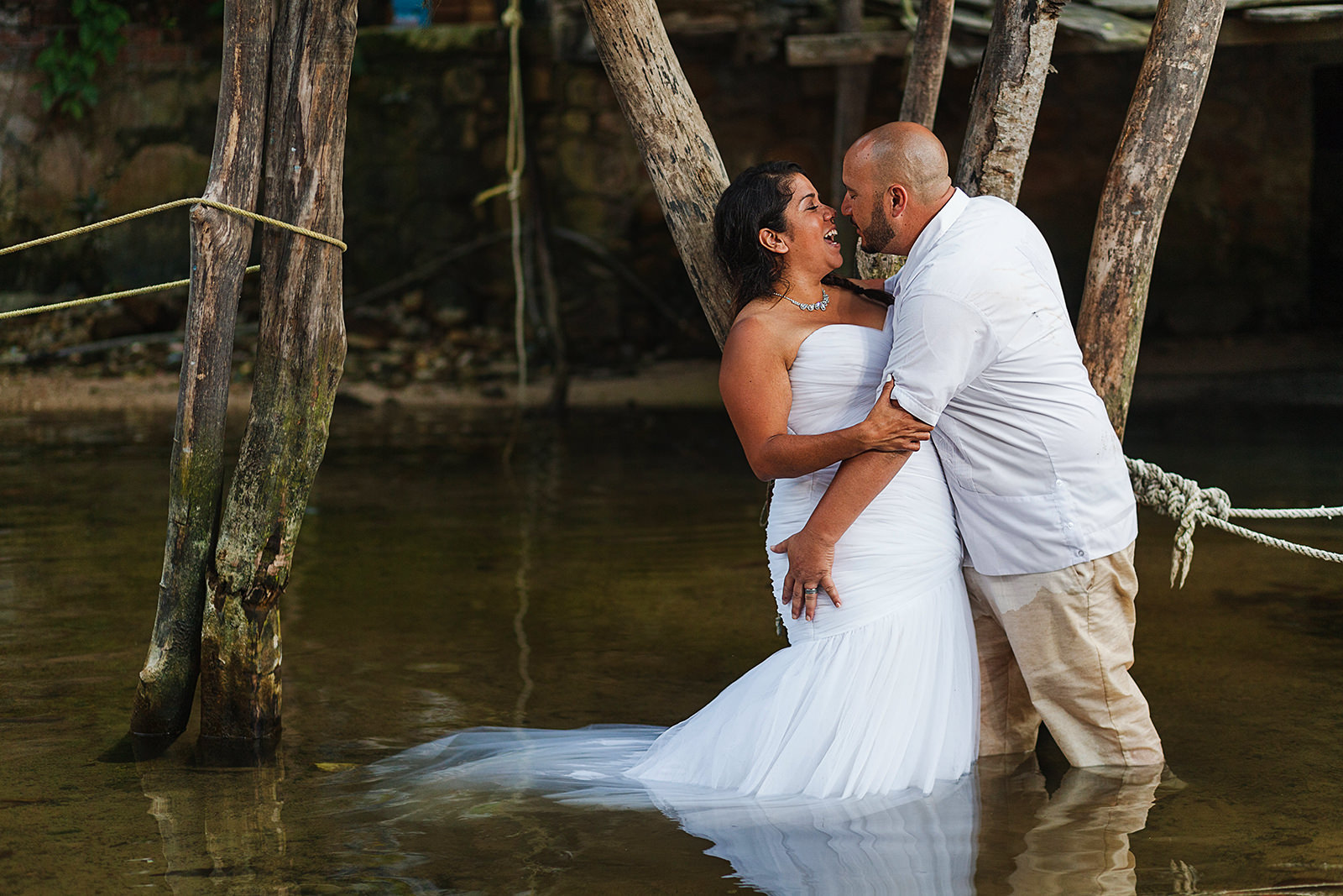 Wedding couple's portrait at Mismaloya during trash the dress session