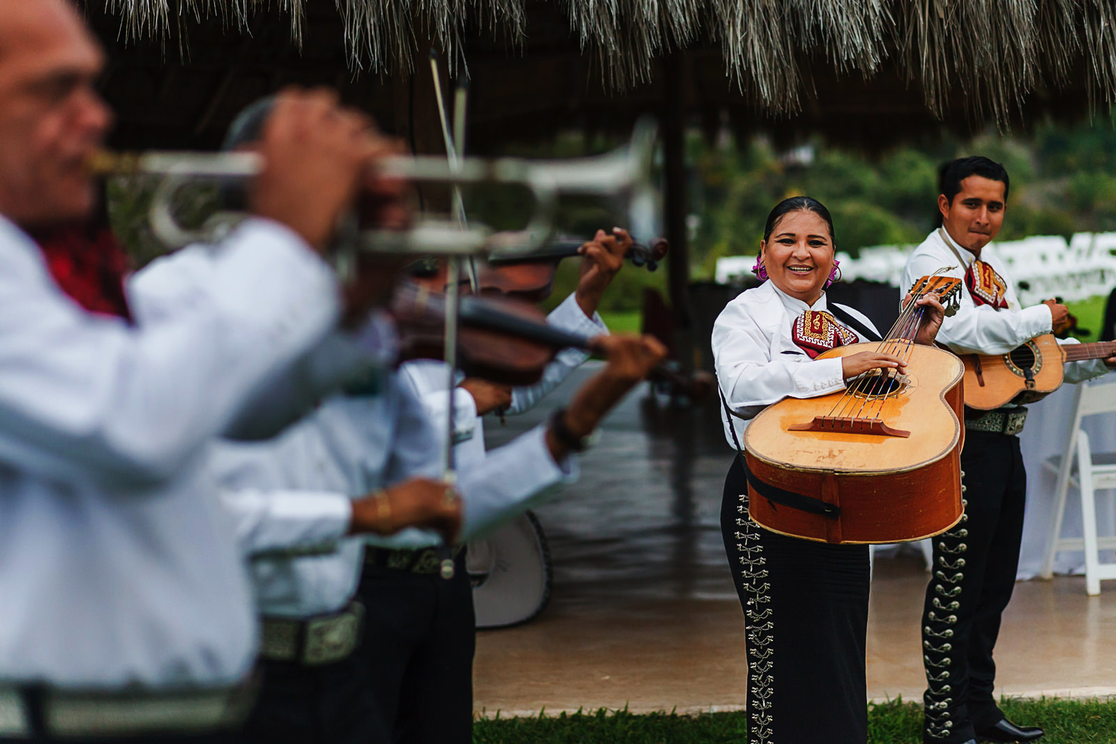girl mariachi music player, more mariachi players can be seen