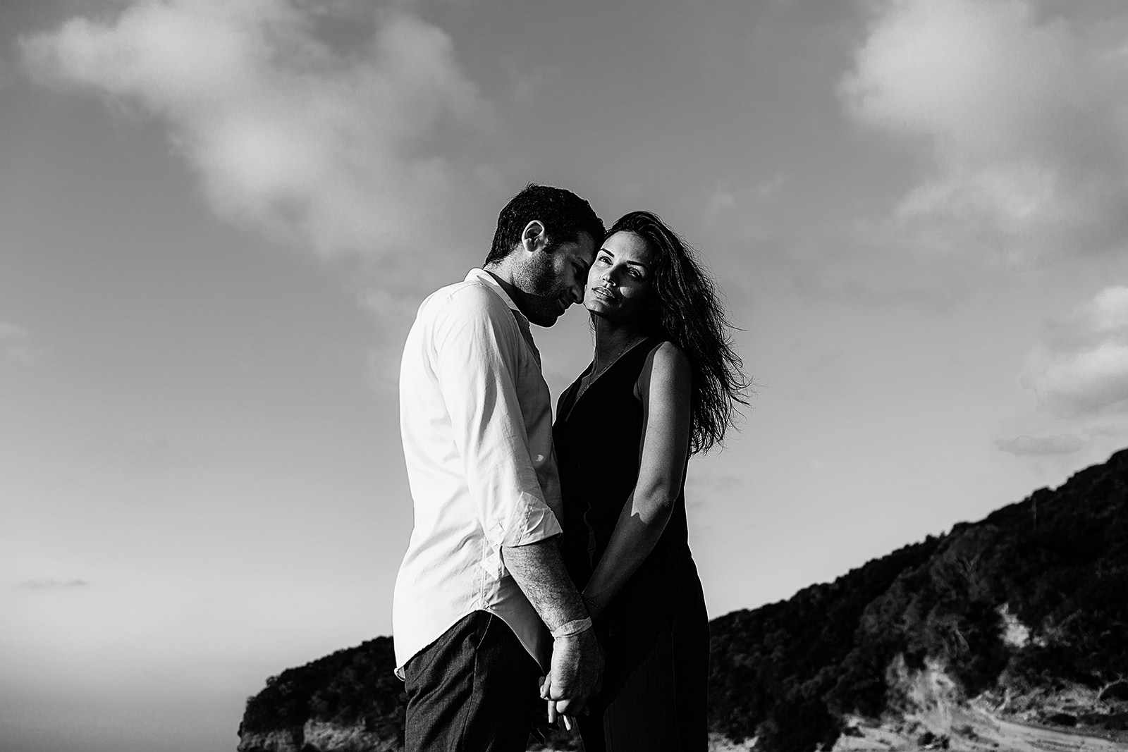 Black and white portrait of couple on the beach