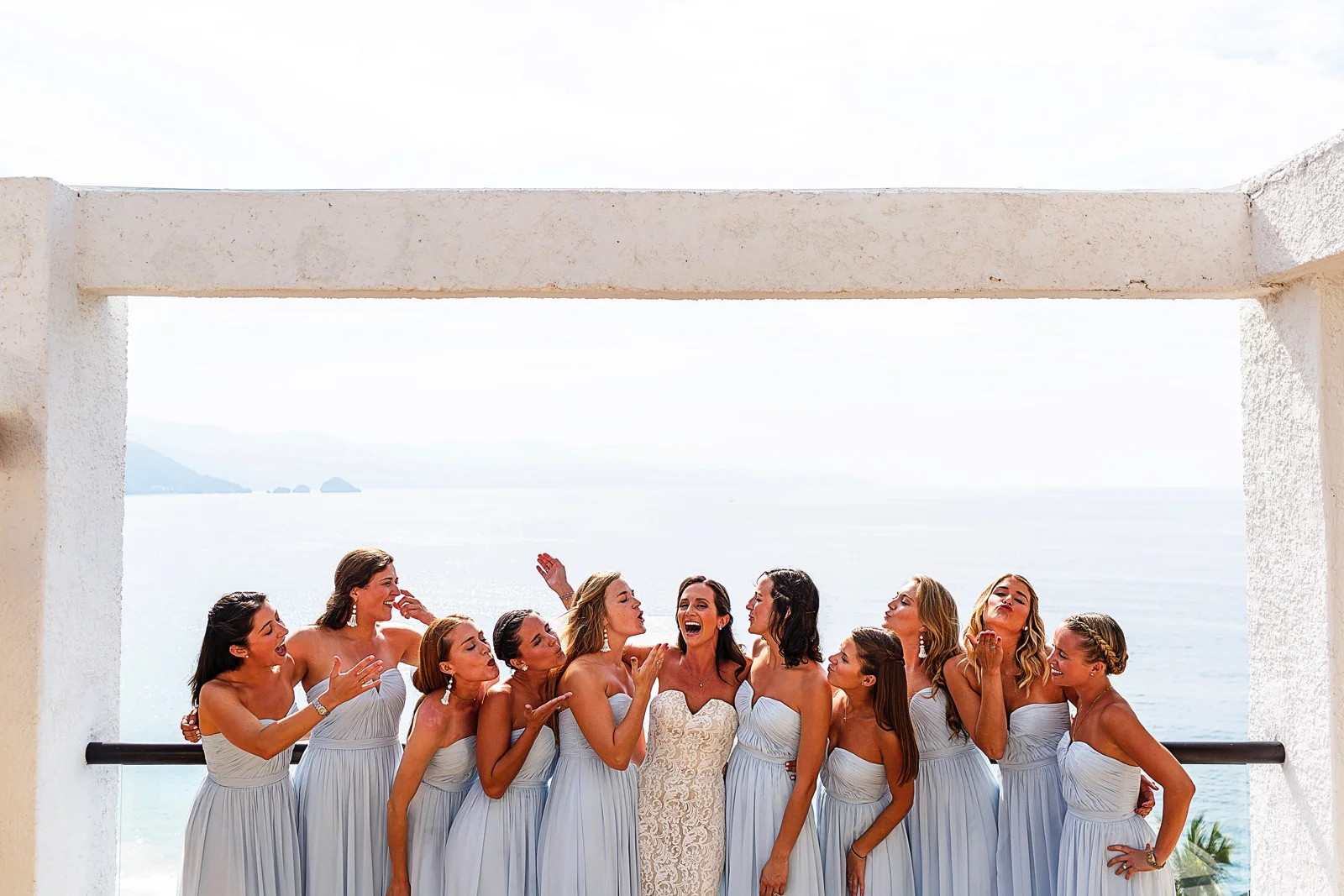 Bride and bridesmaids portrait at the terrace of the suite in Hyatt Ziva resort - Eder Acevedo cancun los cabos vallarta wedding photographer