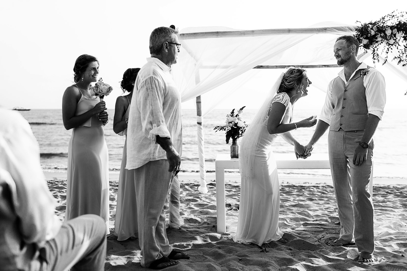 Bride laughing during wedding ceremony