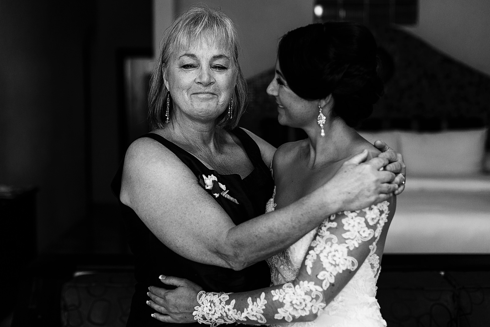 Aunt of the bride crying after a hug