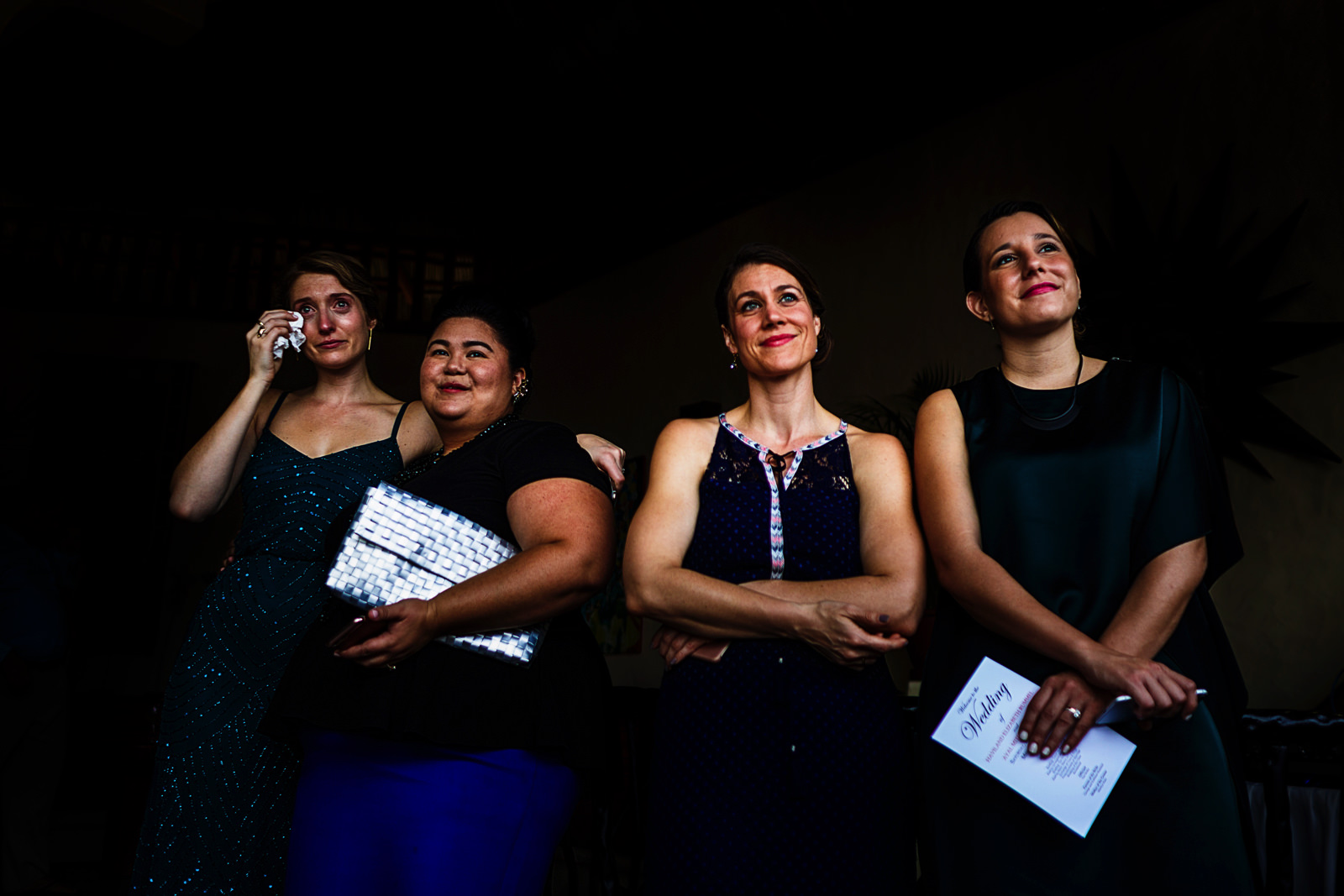 Four of the bride's best friends, one of them is crying