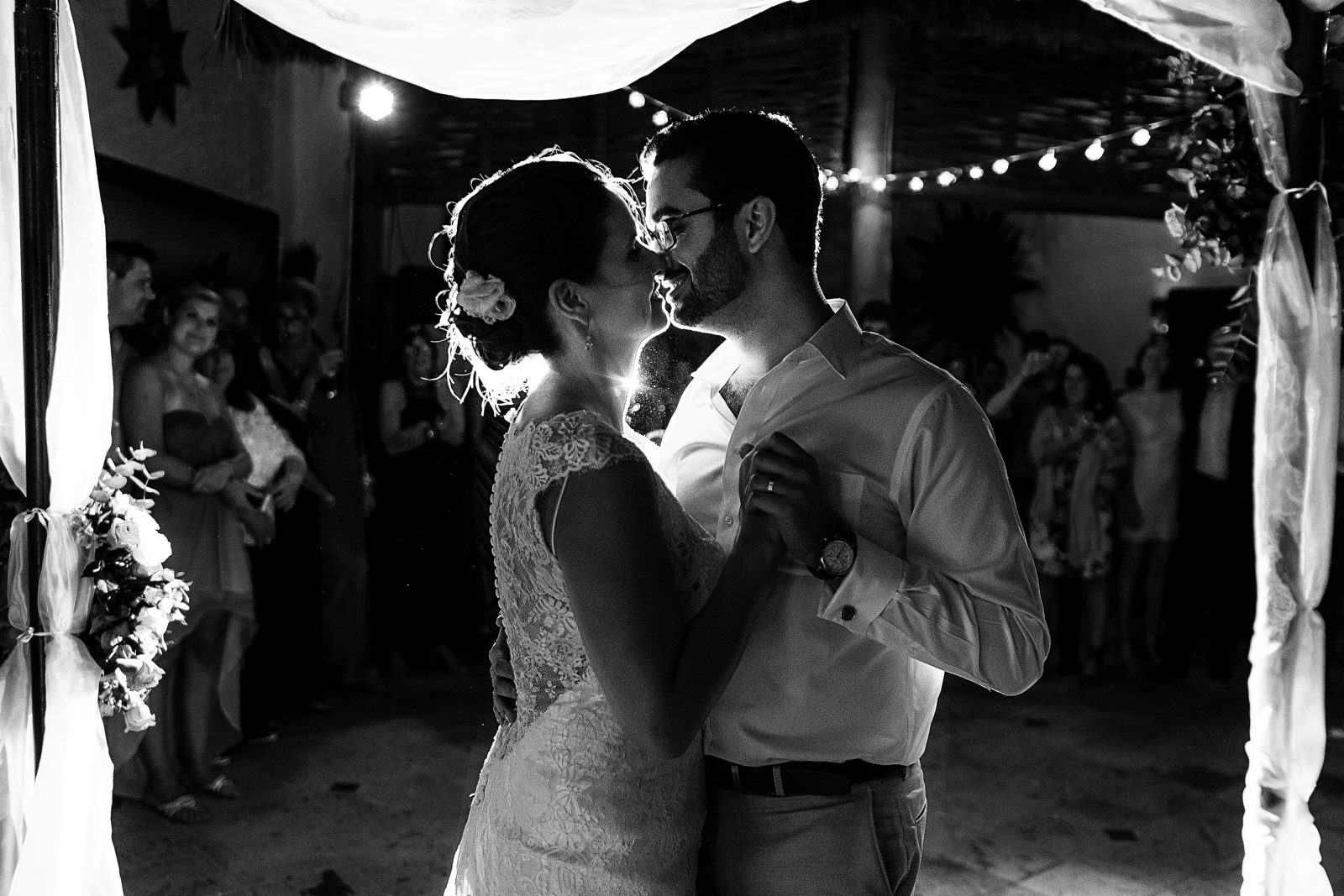 Couple about to kiss during their first dance