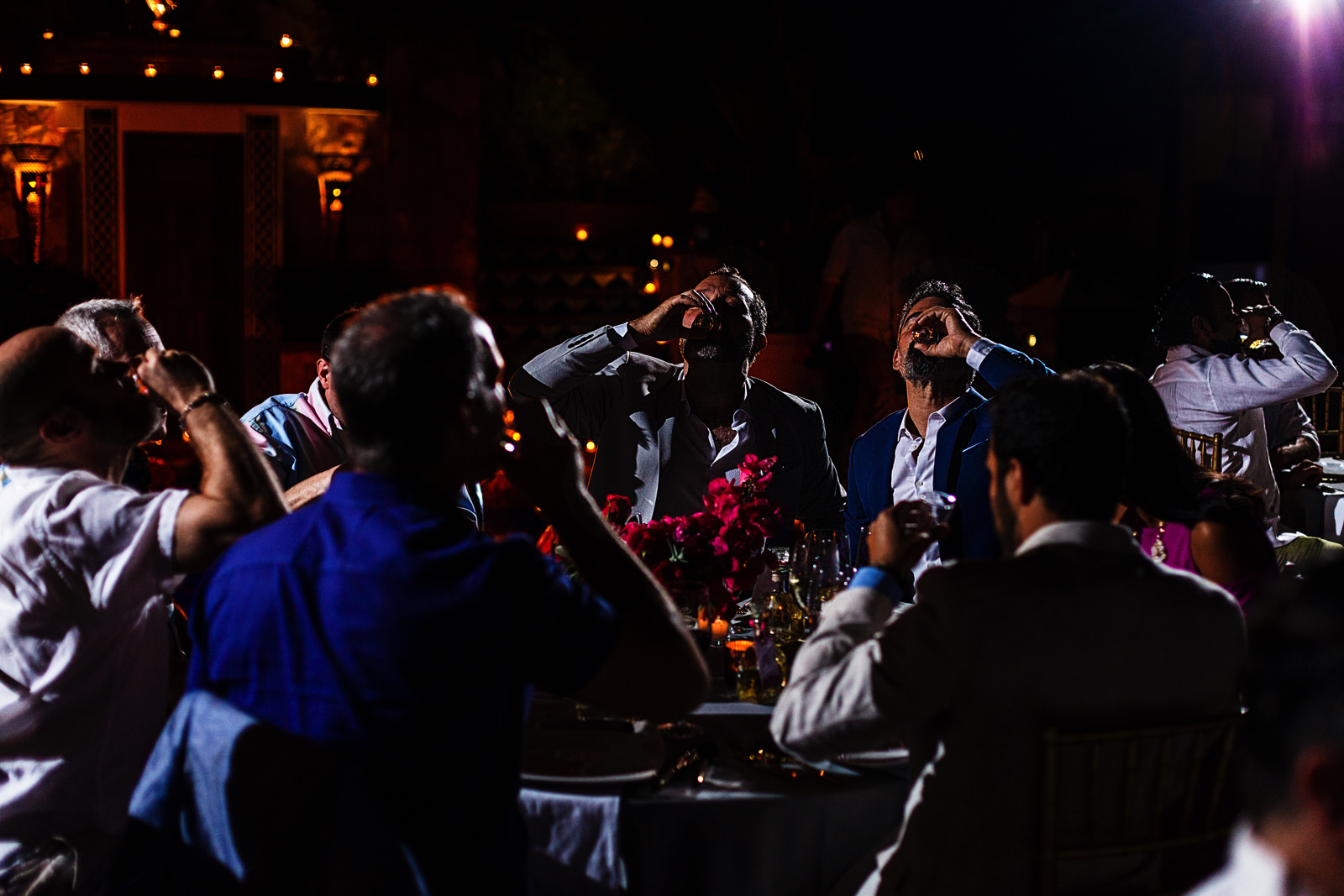 Everybody drinks tequila over a wedding toast
