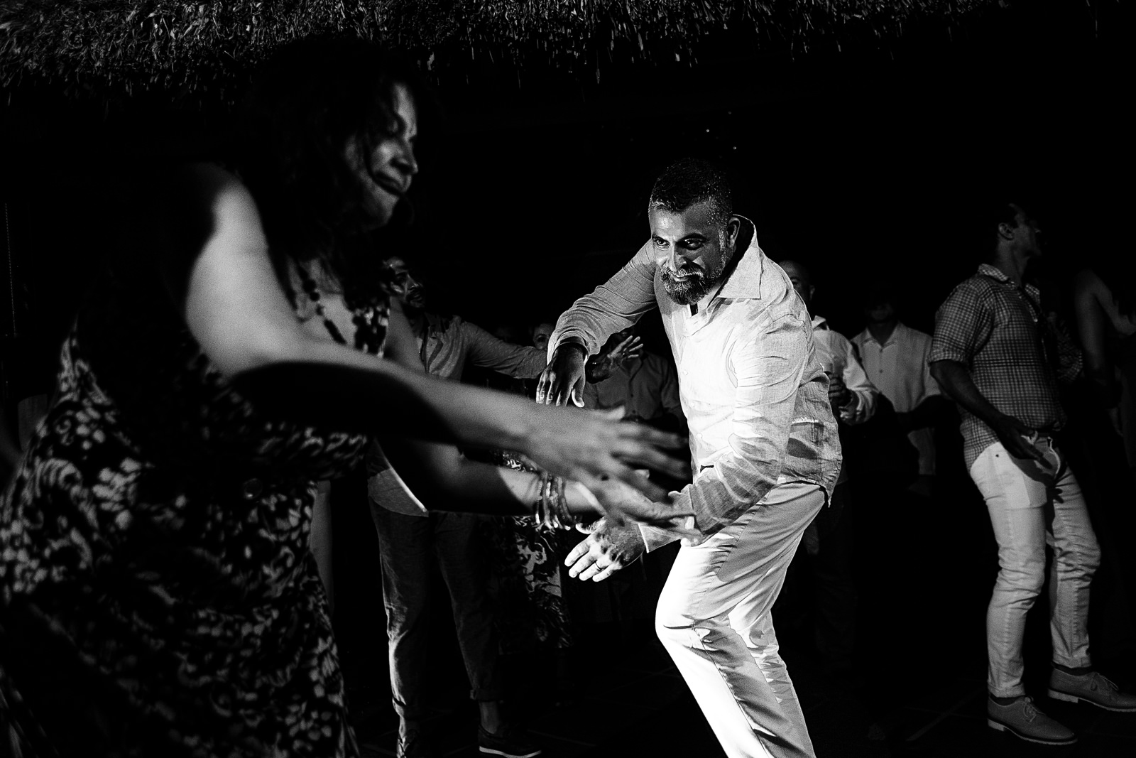 Groom and his sister dancing during the wedding reception