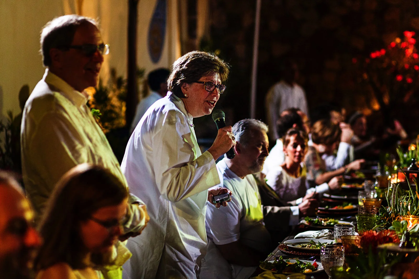Mother of one of the grooms giving a toast speech during the dinner at Casa Karma
