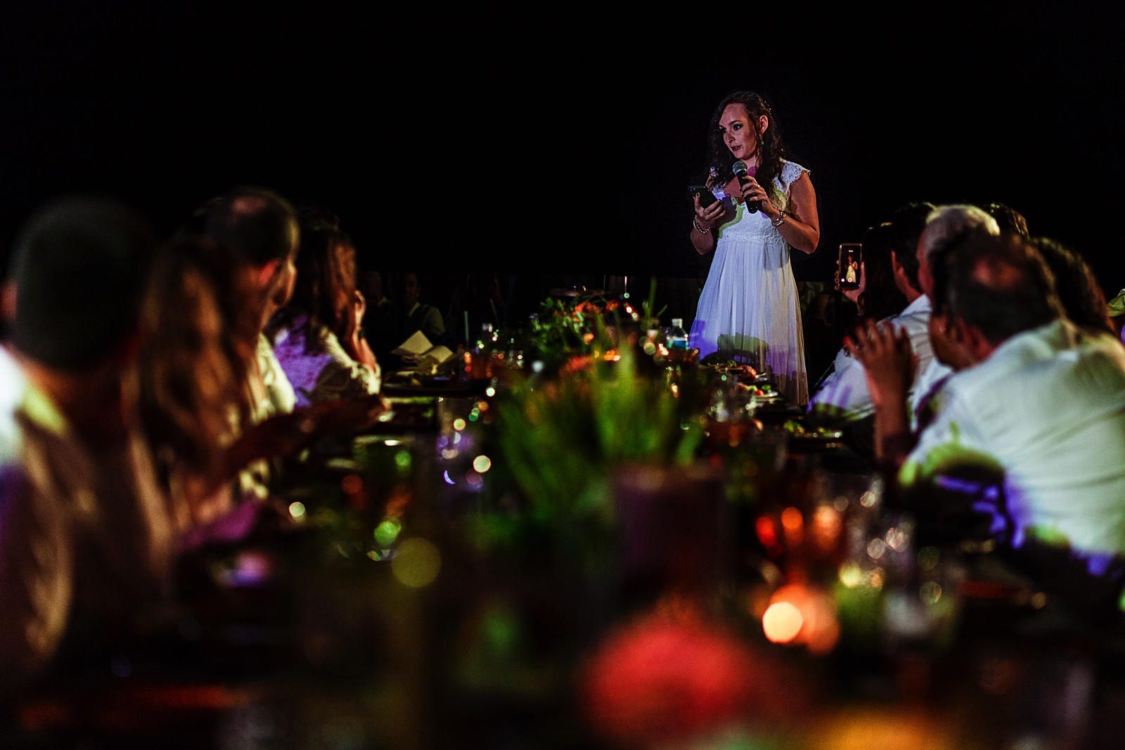 Sister of one of the grooms giving a toast speech during the dinner at Casa Karma