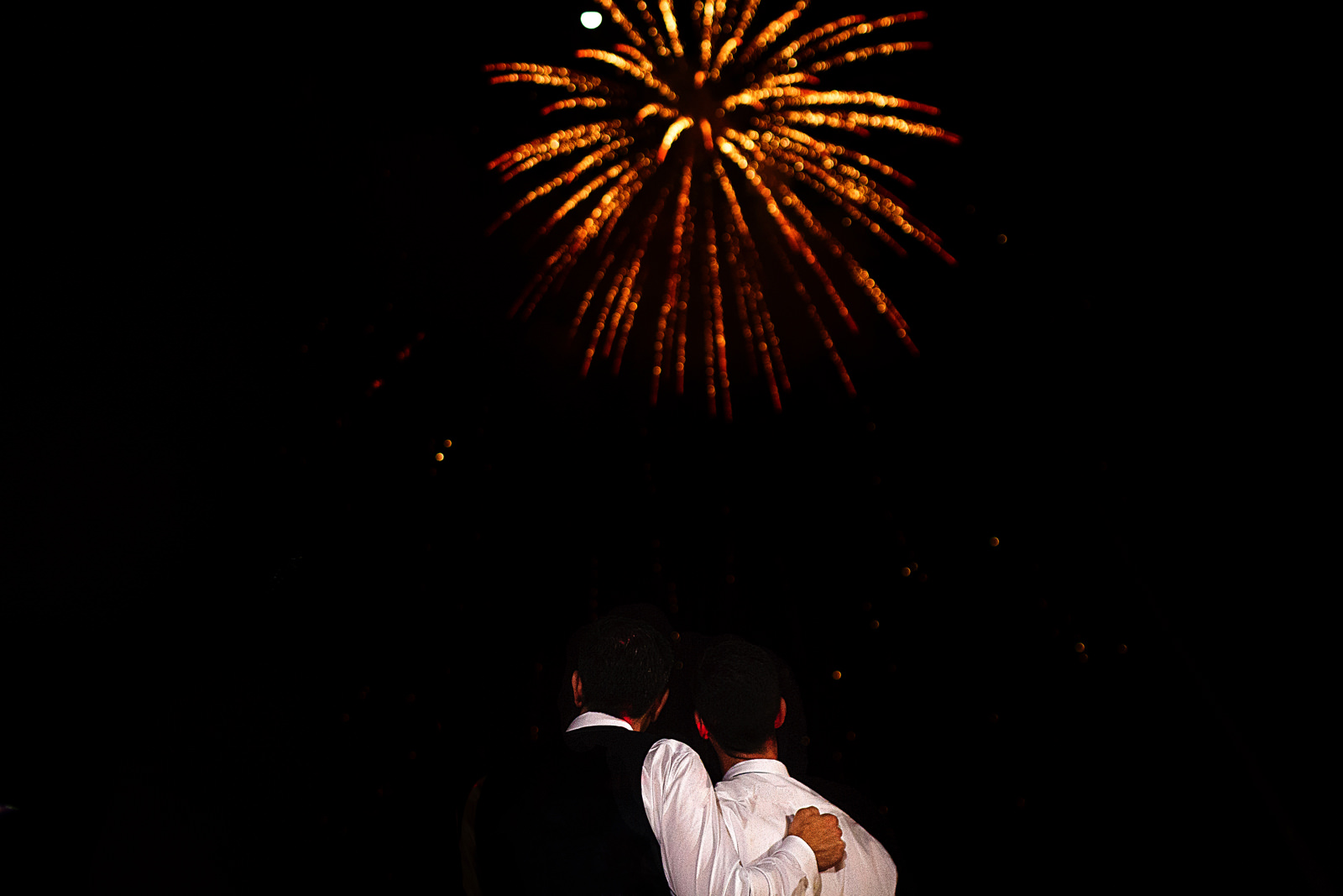 Fireworks at the end of the couple's first dance as part of their destination wedding in Mexico