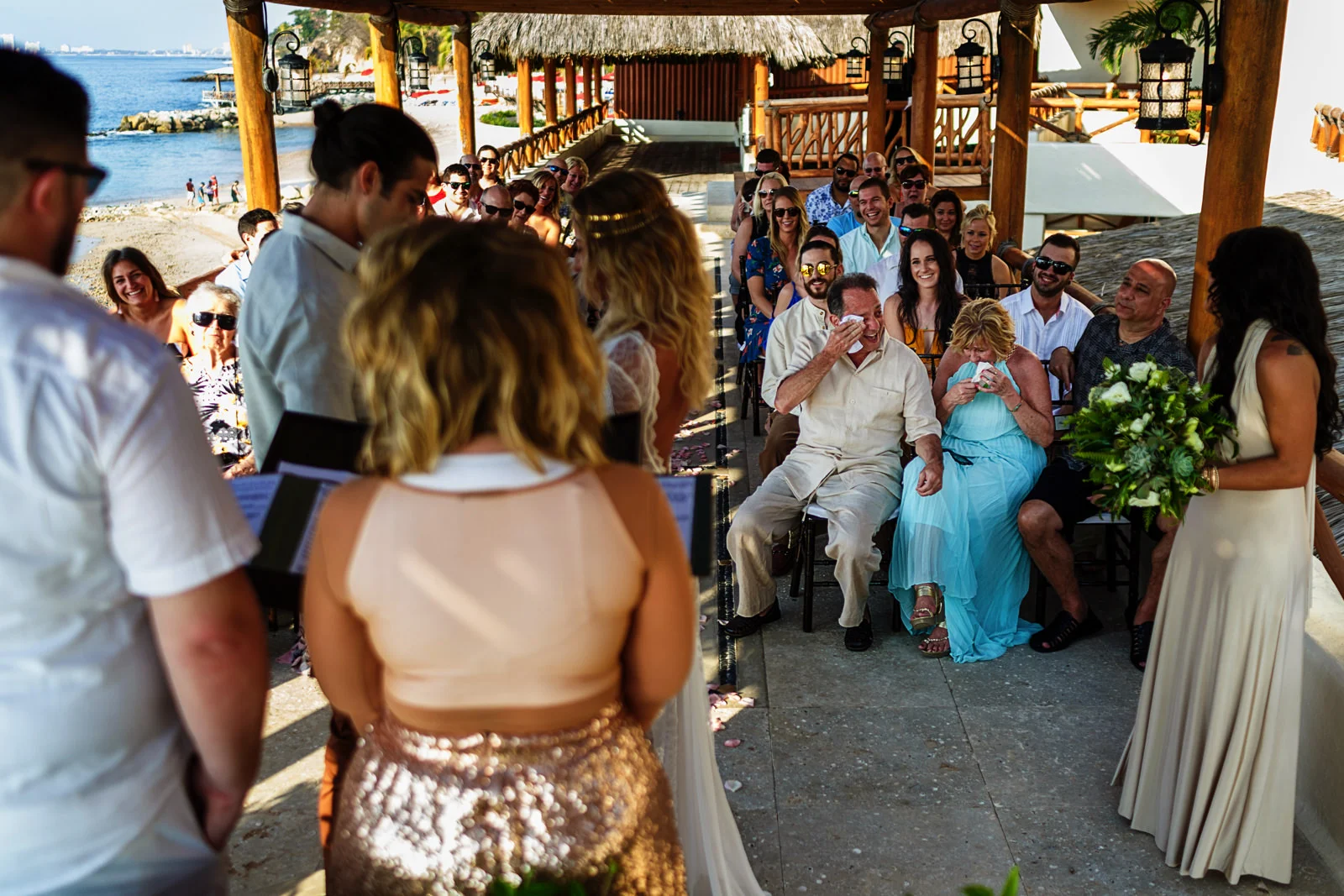 Parents of the bride laughing during the wedding ceremony