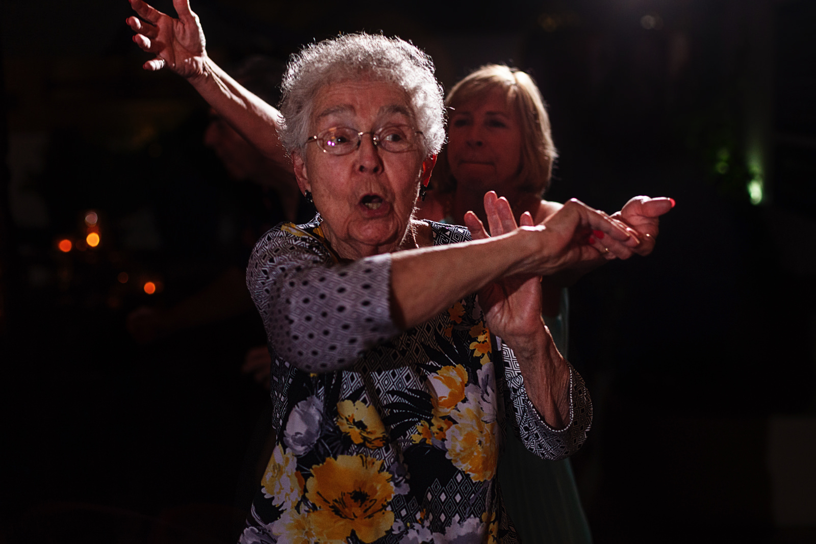 Grandmother and mother of the bride dancing in the dance floor
