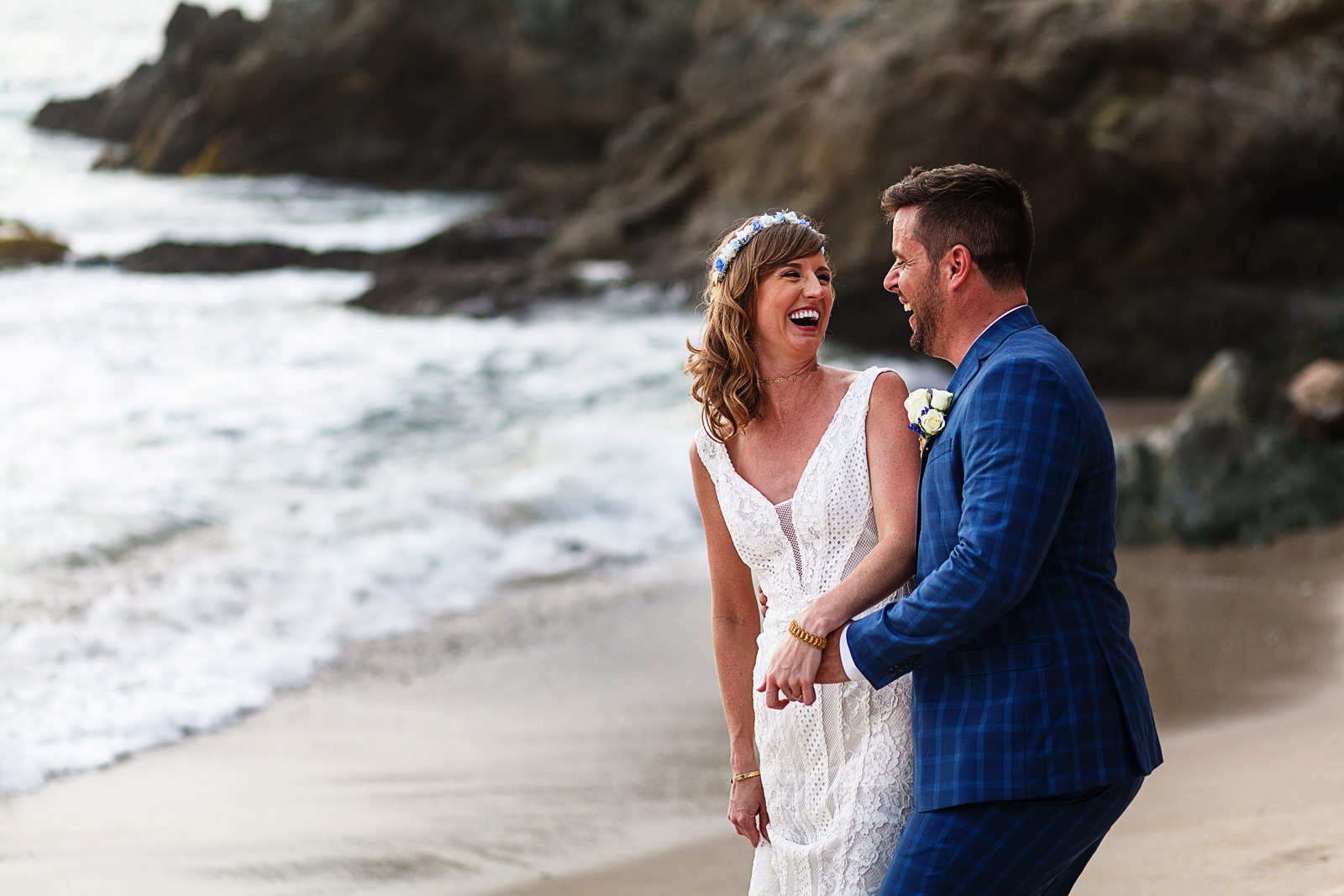 Wedding portrait bride and groom on the beach after their ceremony