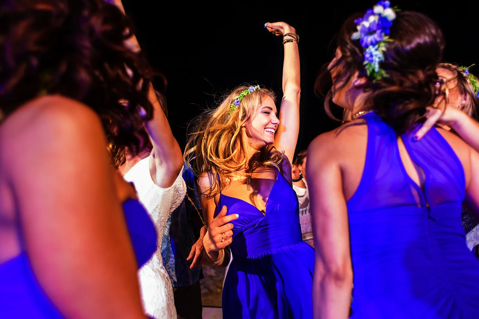 Bridesmaids going nuts on the dance floor